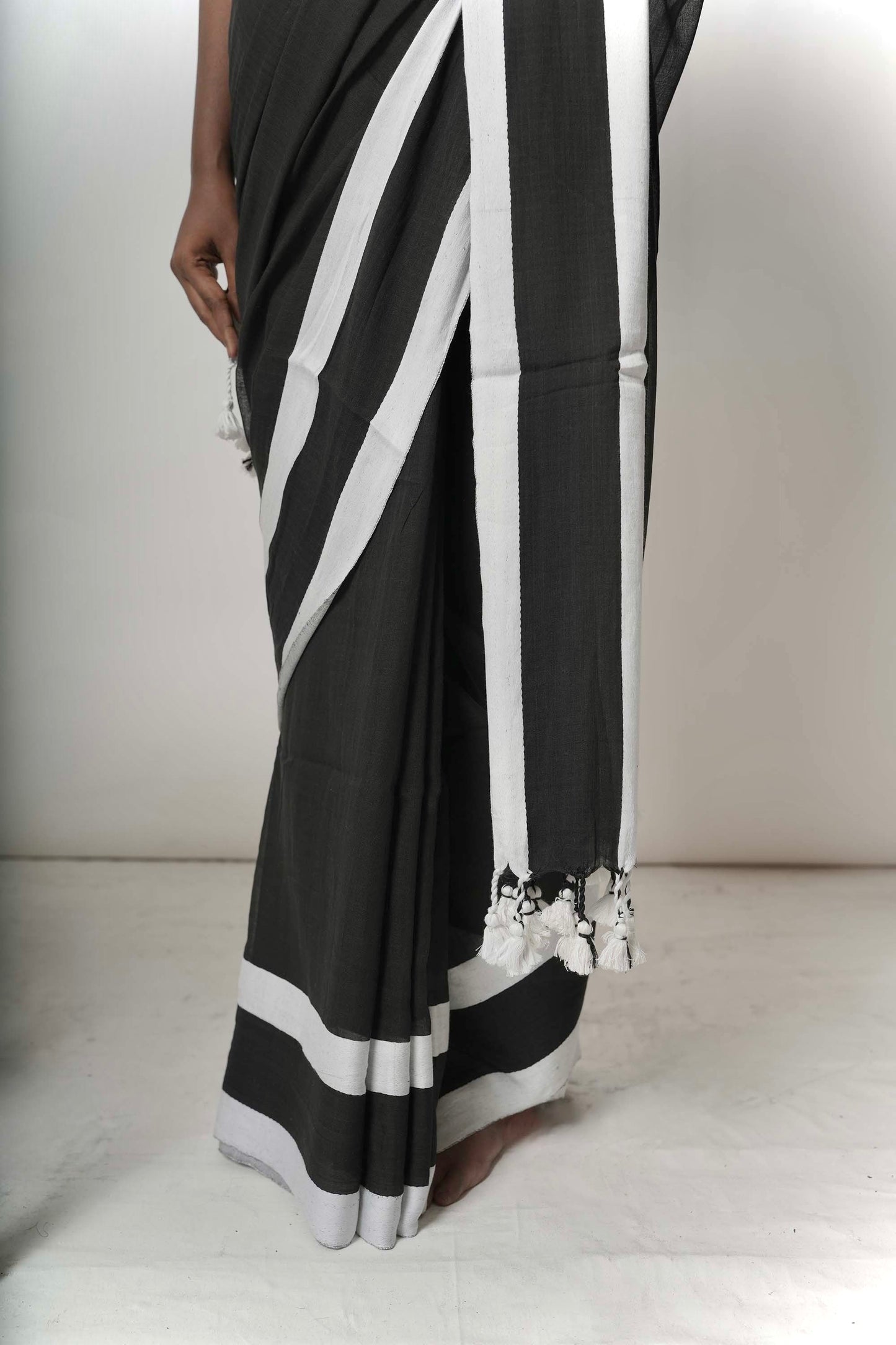 Enigma I Black cotton handloom saree with white coloured twill jacquard border