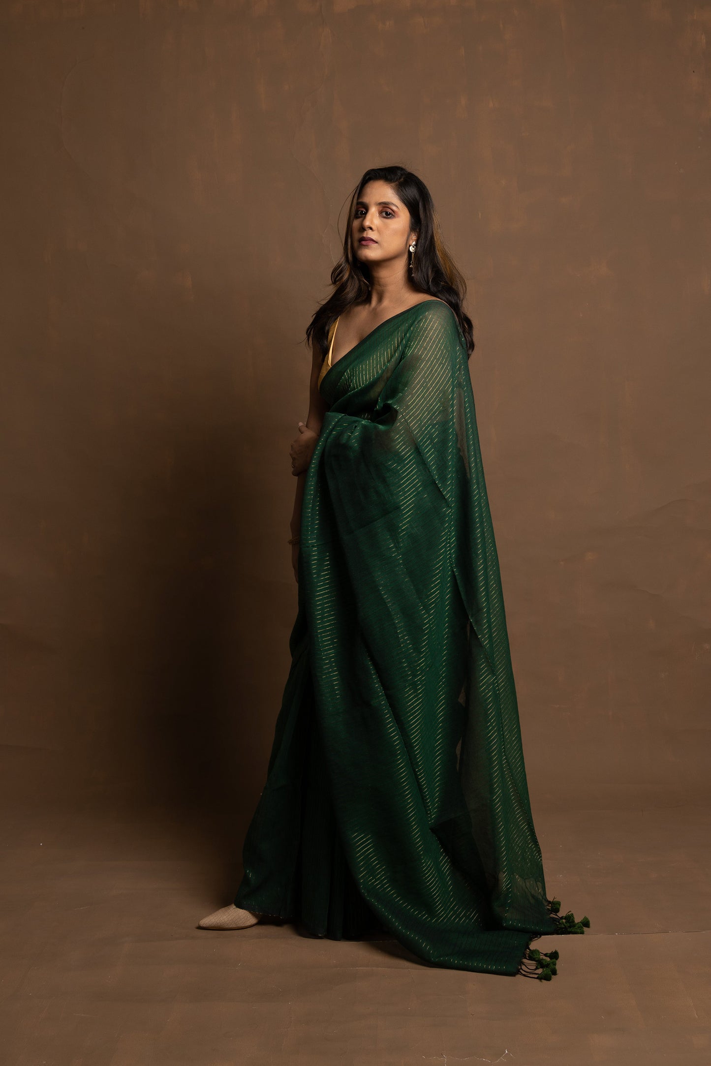 Hara rang | Deep green handloom cotton saree with zari stripes