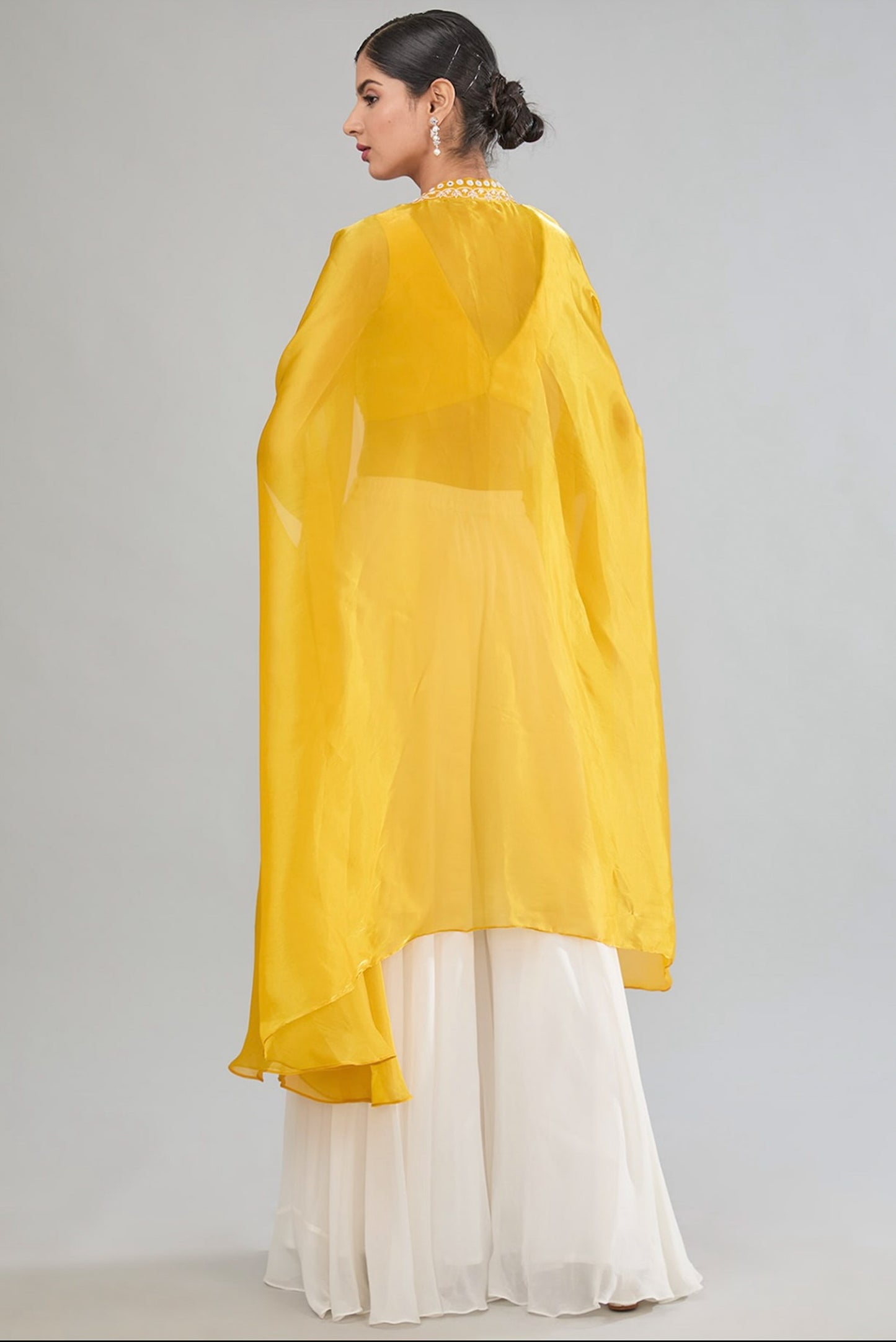 Yellow Hand Embroidered Flared pant with cape and blouse