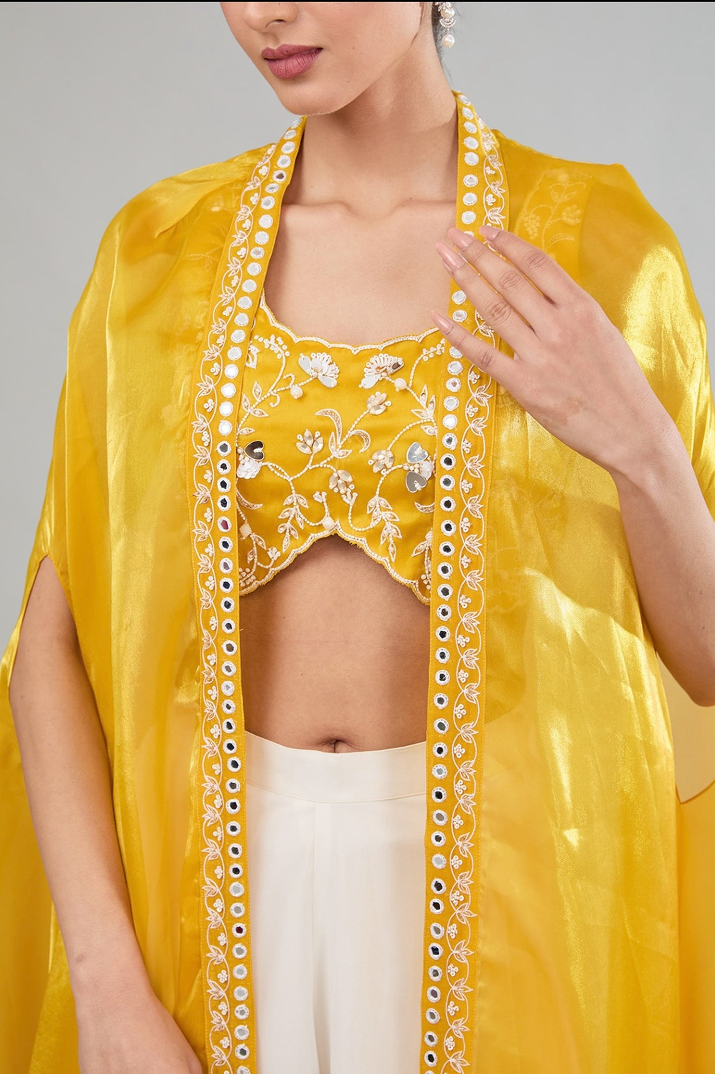 Yellow Hand Embroidered Flared pant with cape and blouse