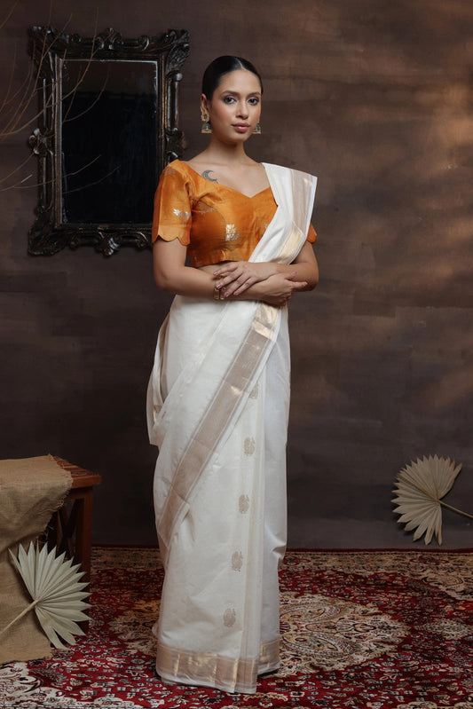 Off White Handloom pure cotton Kasavu Saree with Gold zari border & motifs