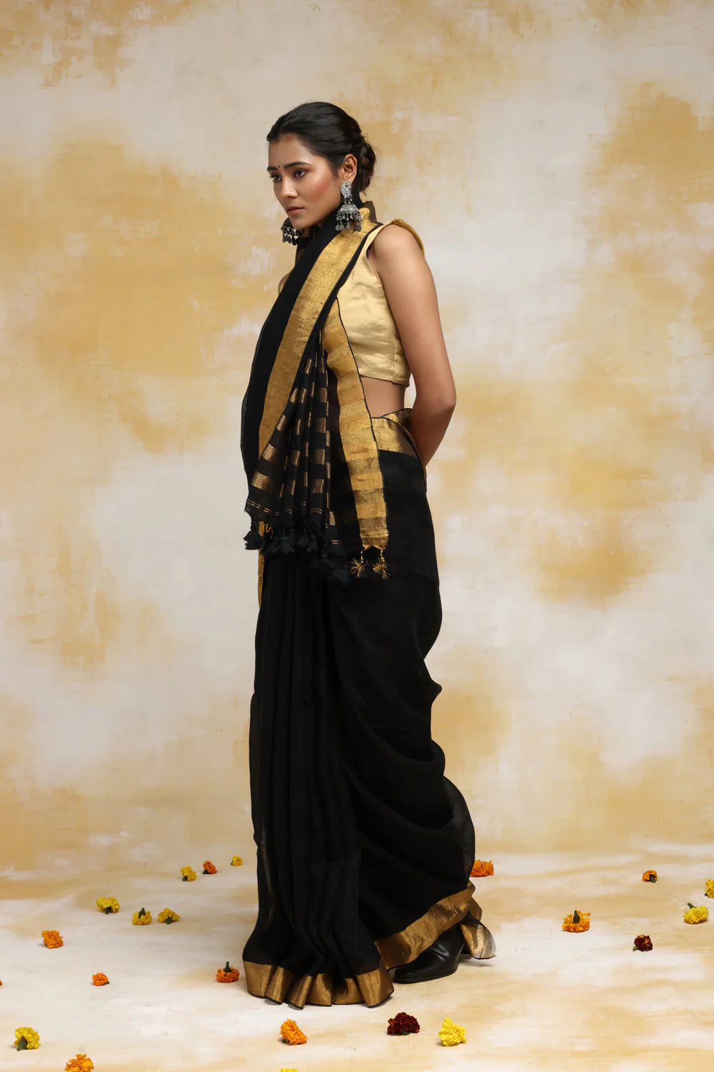 Handloom Black Linen Saree With Gold Zari Border & Zari Stripes In Pallu With Tassels