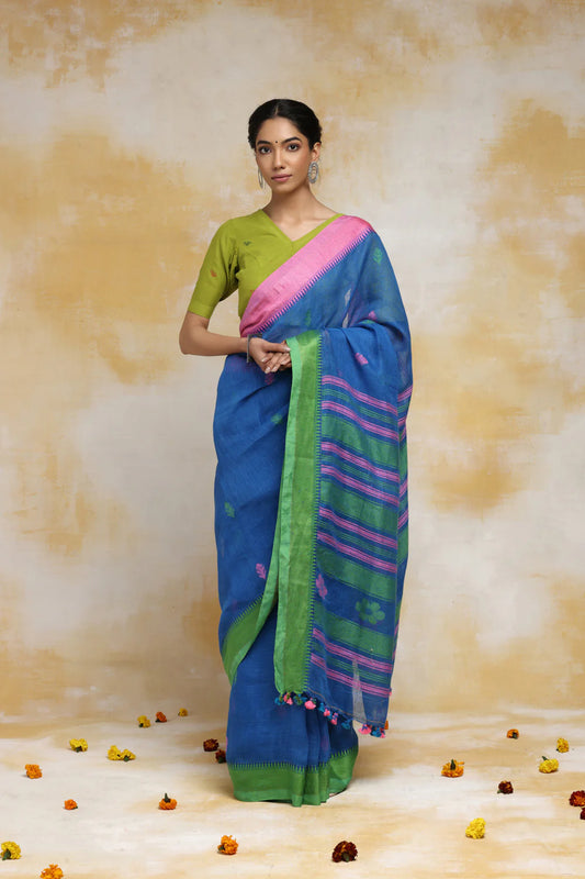 Handloom Blue Linen Saree With Pink & Green Floral Motifs And Tassels