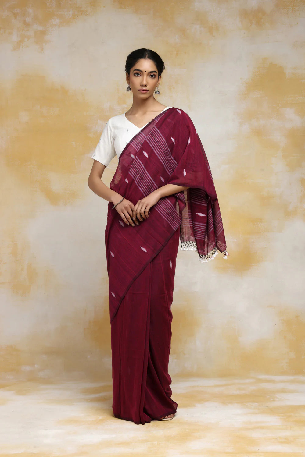 Handloom Wine Mulmul Cotton Saree With White Booti And Tassels