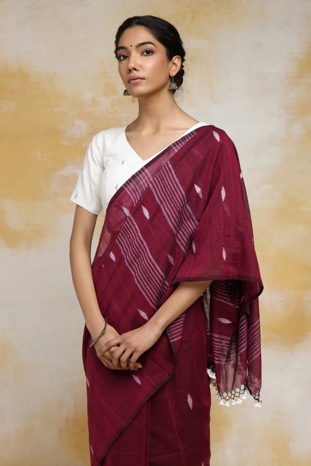 Handloom Wine Mulmul Cotton Saree With White Booti And Tassels