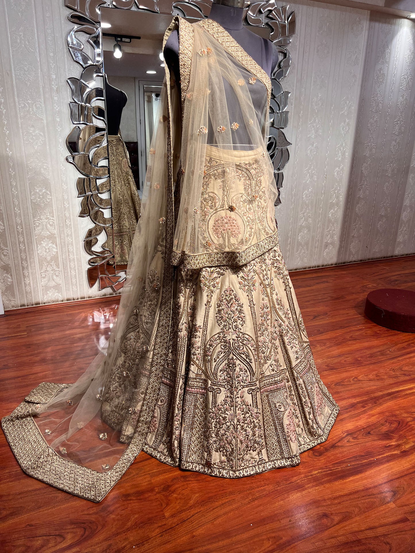 Golden colored Hand embroidered Raw Silk resham bridal lehenga