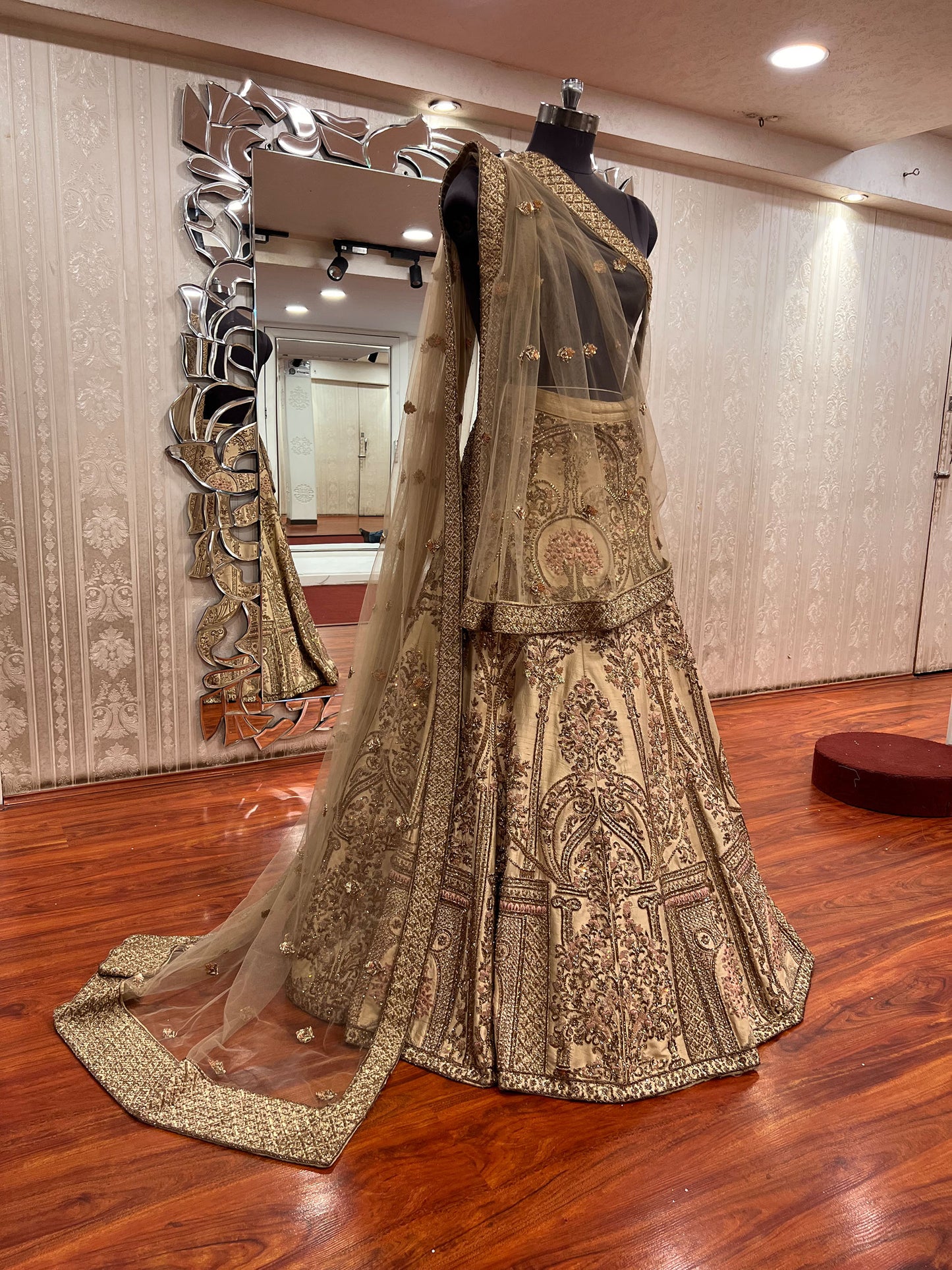 Golden colored Hand embroidered Raw Silk resham bridal lehenga