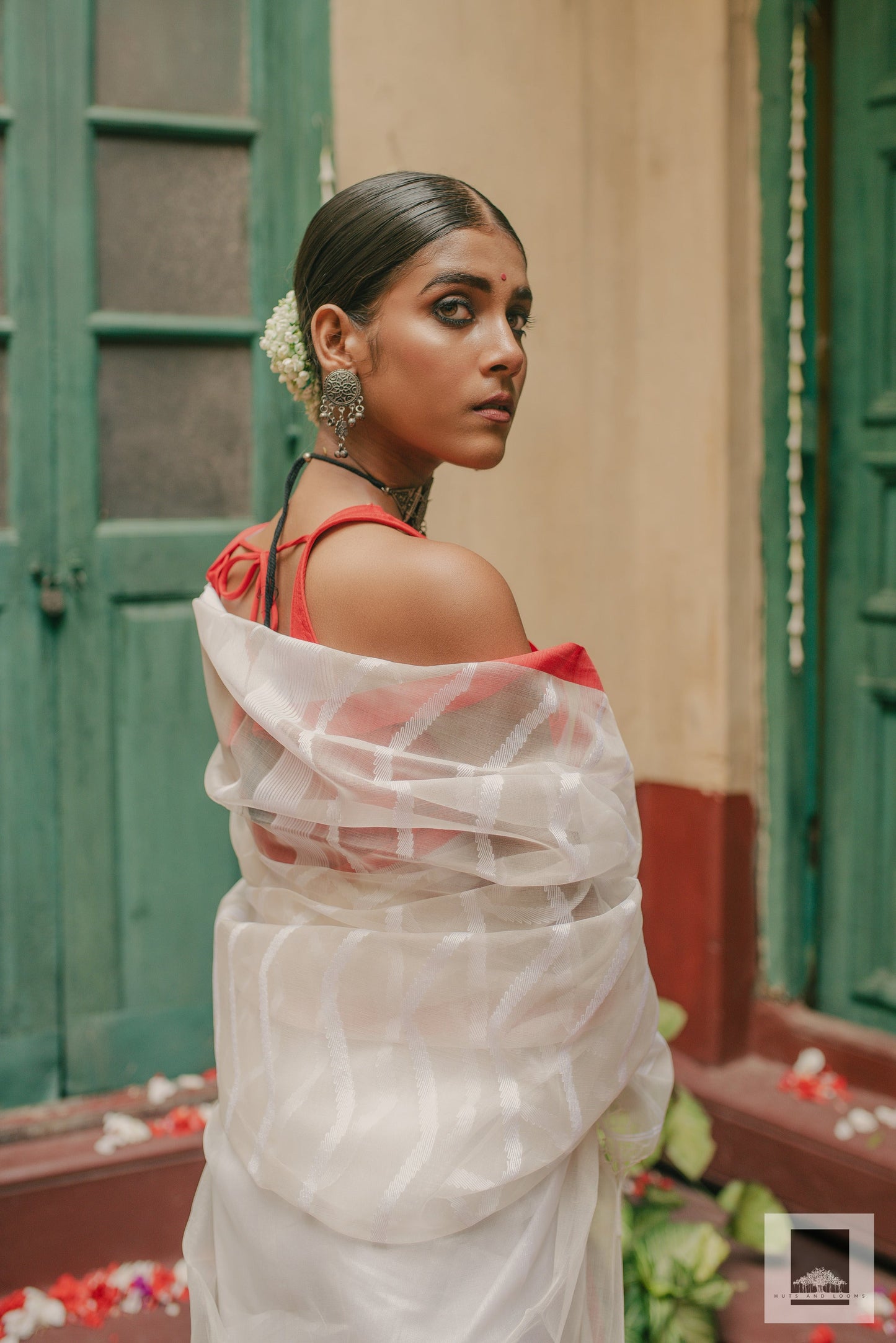 Jaya | Handloom red and white Puja saree