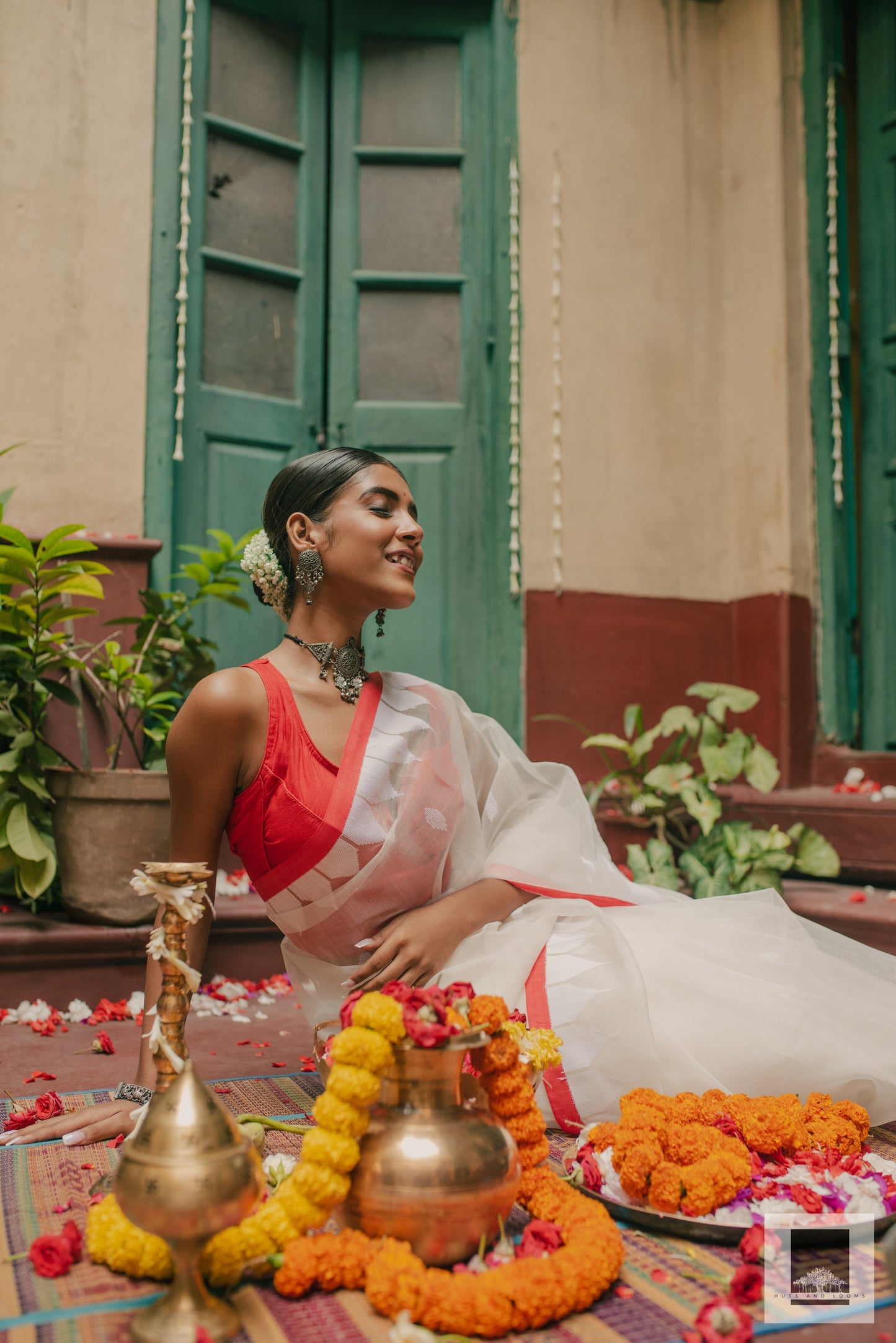 Jaya | Handloom red and white Puja saree