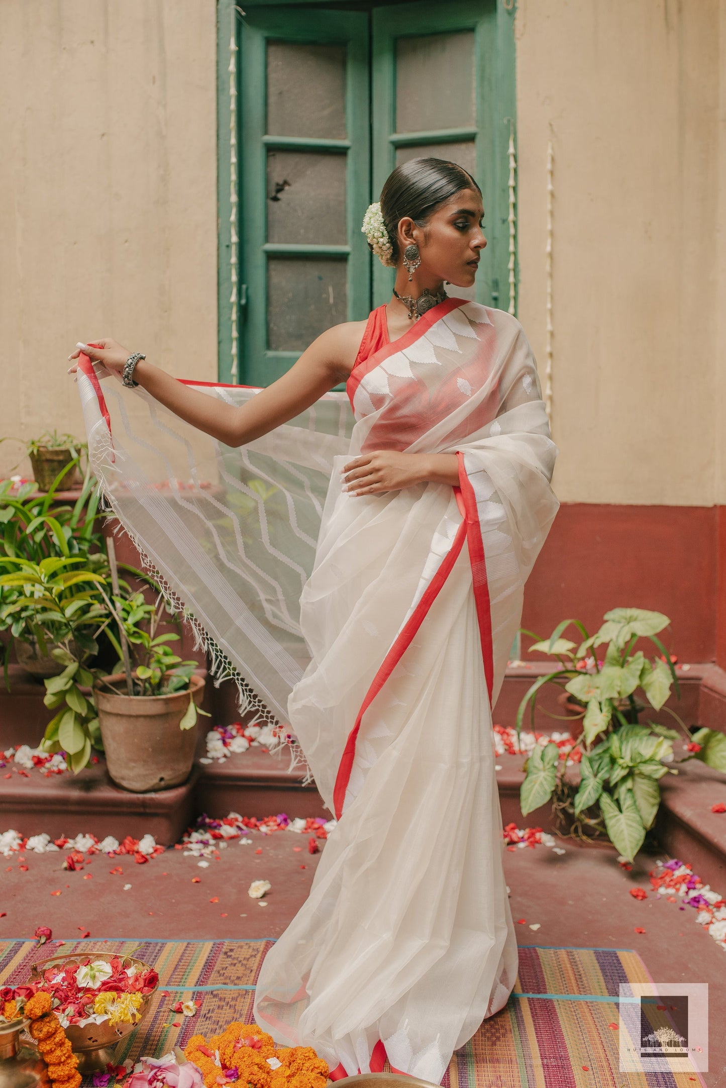 Jaya | Handloom red and white Puja saree