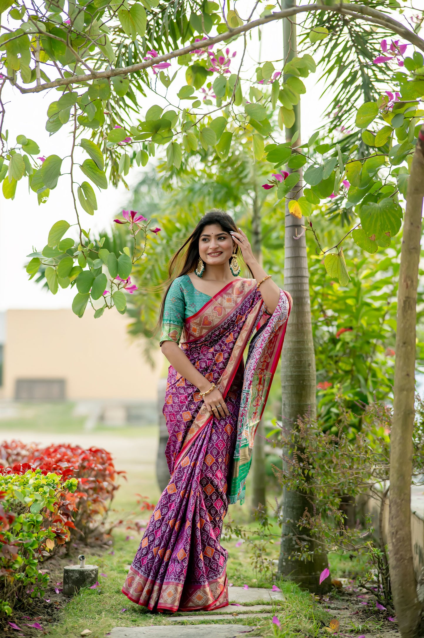 Krina Wine Banarasi Silk meenakari patola weaves Saree