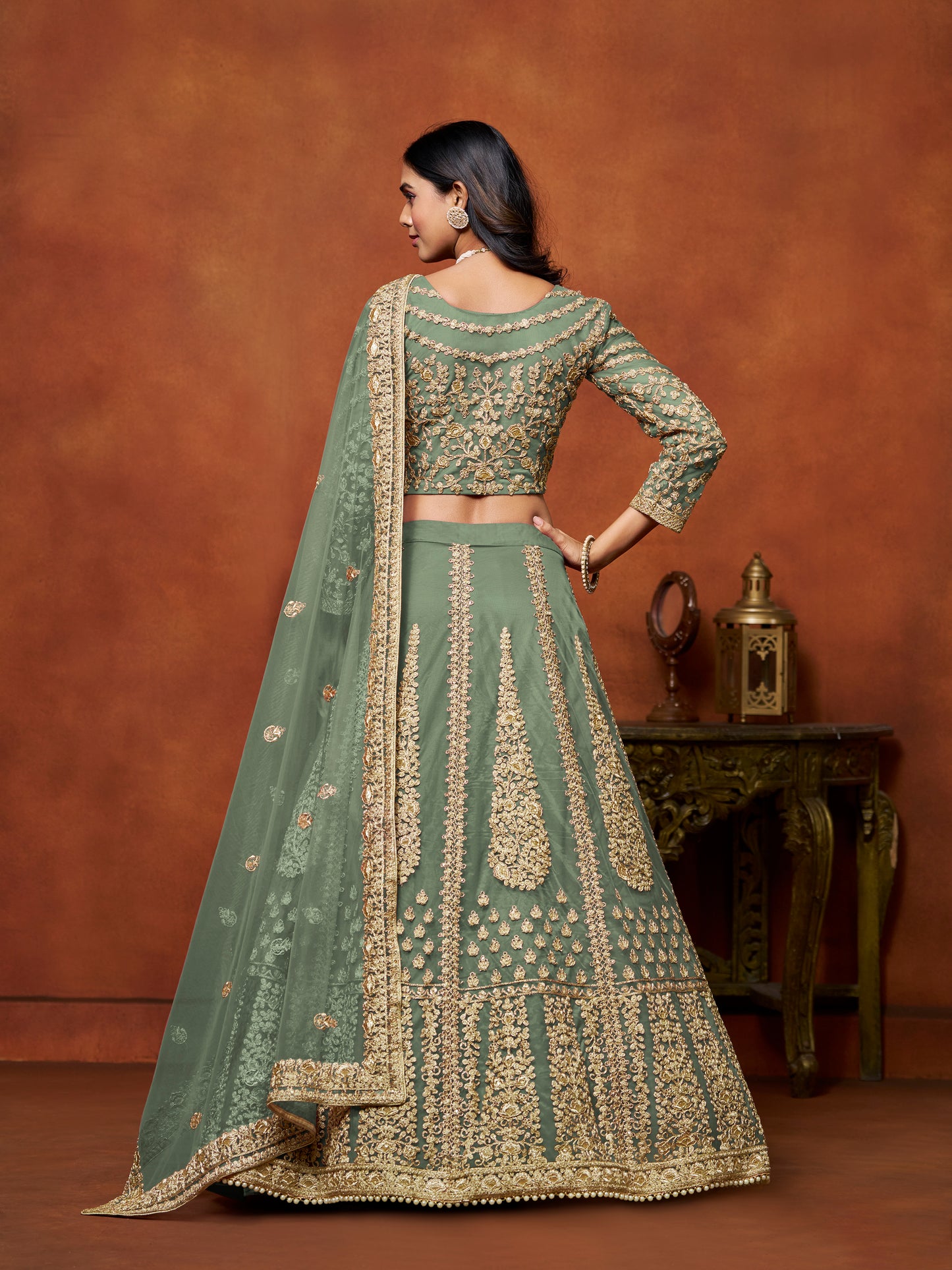 Green Sequins & Thread Embroidery Net Engagement Lehenga