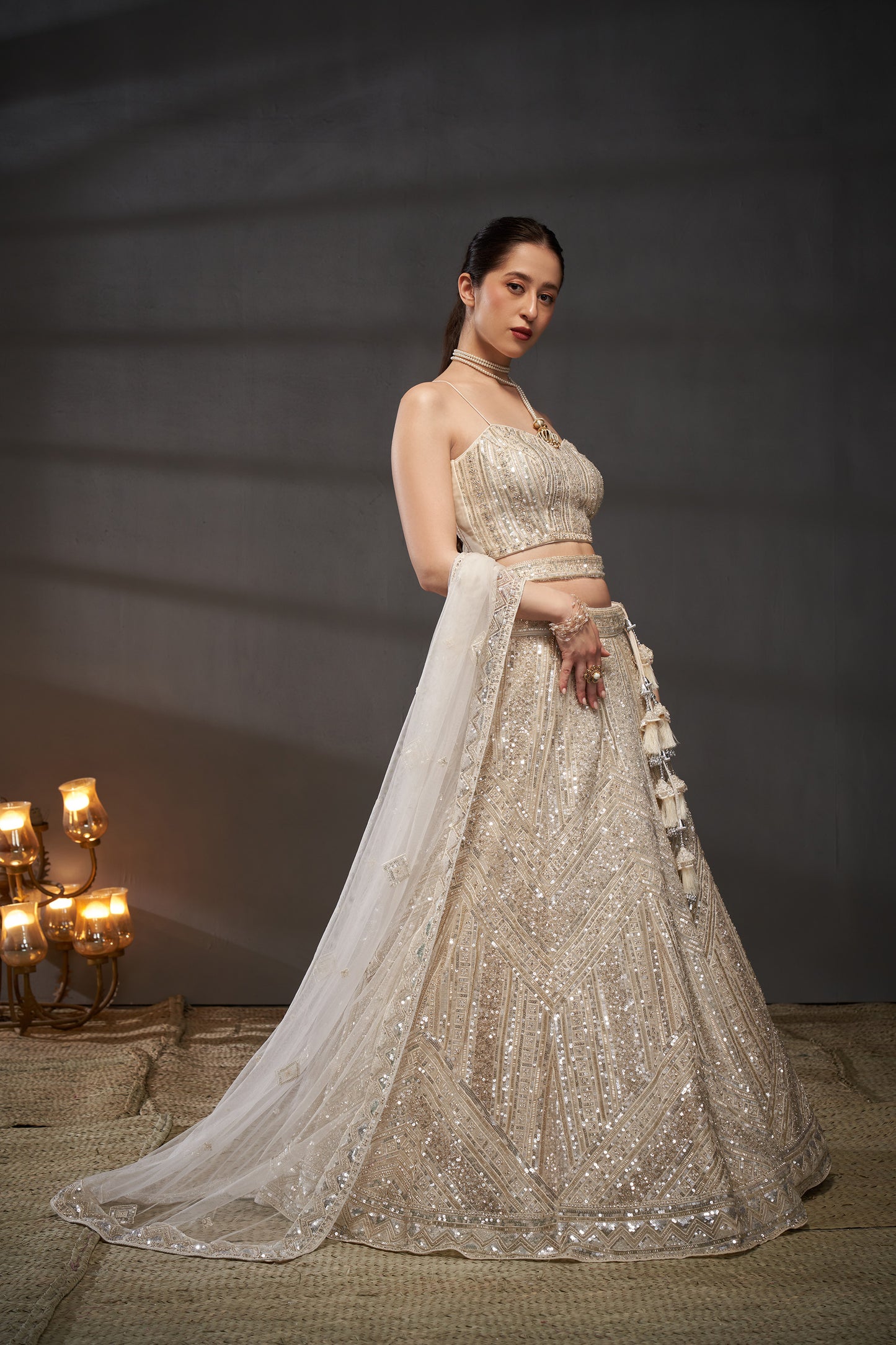 Cream Net Cutdana, Sequins and Zarkan embroidery Lehenga