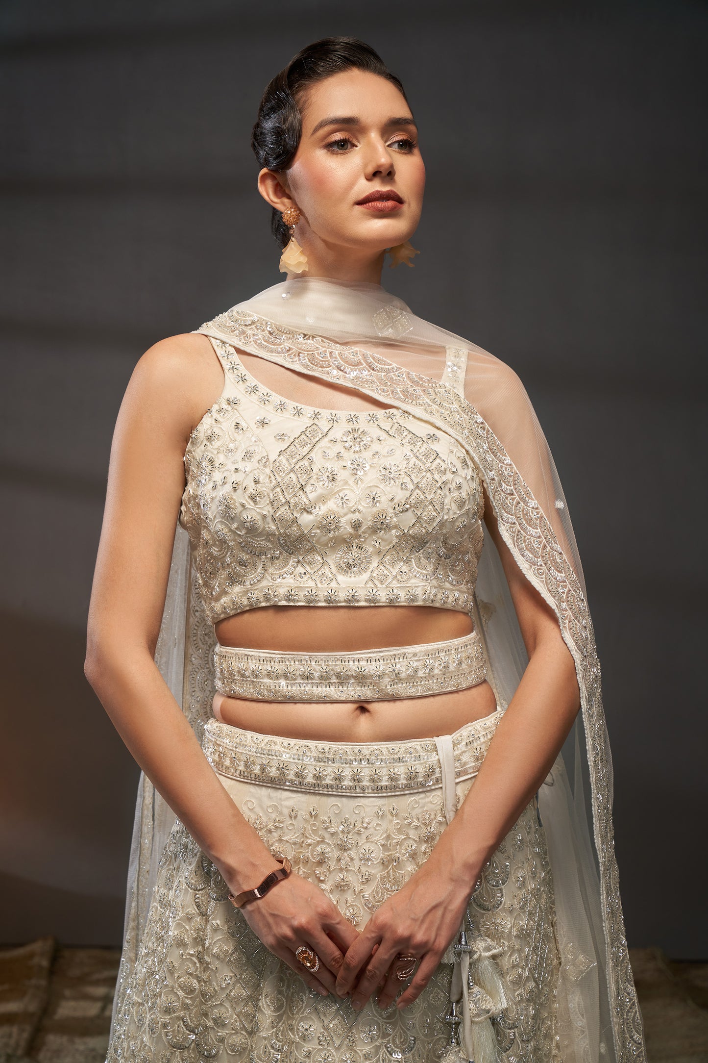 Cream Net Cutdana, Sequins and Zarkan embroidery Lehenga