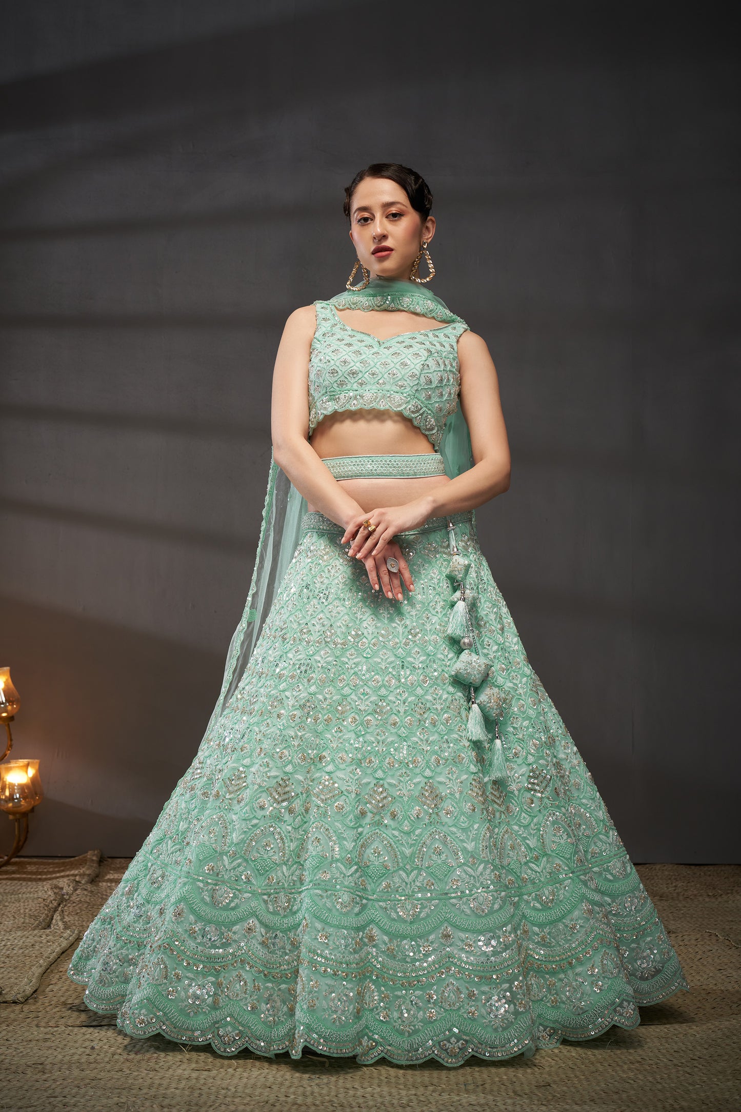 Turquoise blue Net Cutdana, Sequins and Zarkan embroidery Lehenga