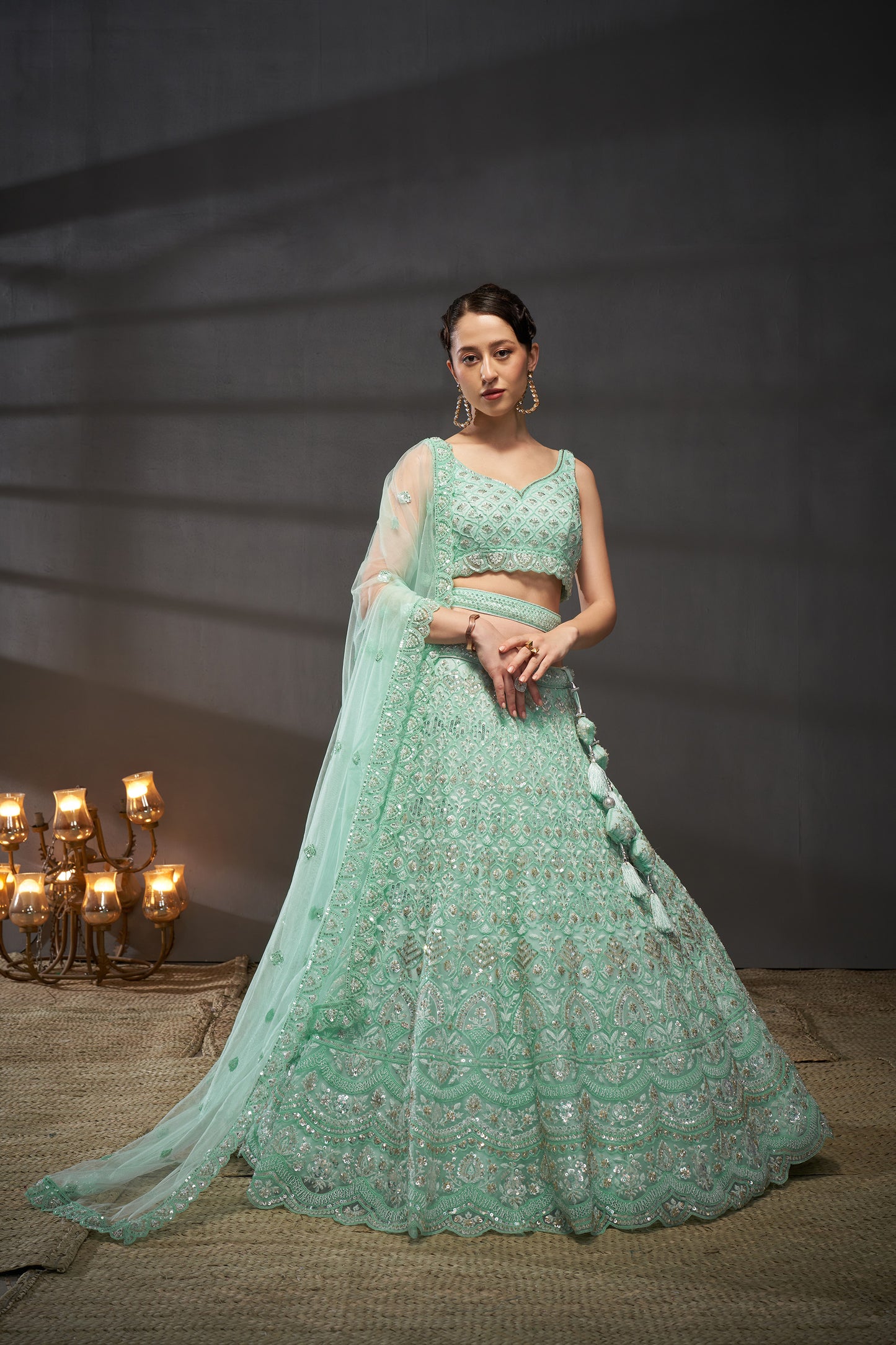 Turquoise blue Net Cutdana, Sequins and Zarkan embroidery Lehenga