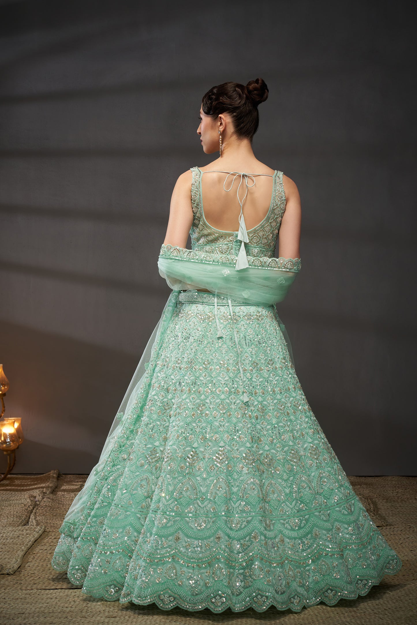 Turquoise blue Net Cutdana, Sequins and Zarkan embroidery Lehenga