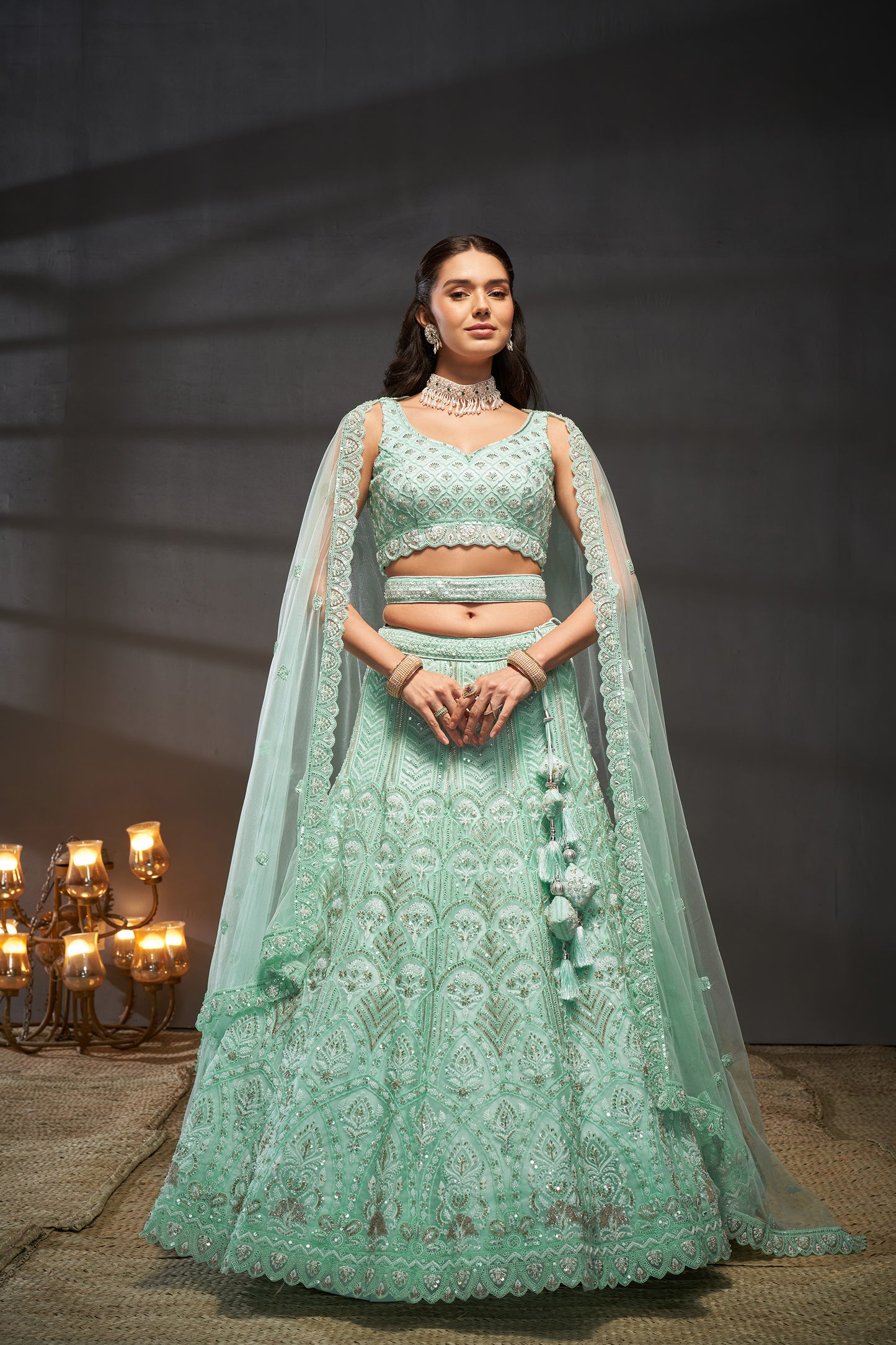 Turquoise blue Net Cutdana, Sequins and Zarkan embroidery Lehenga