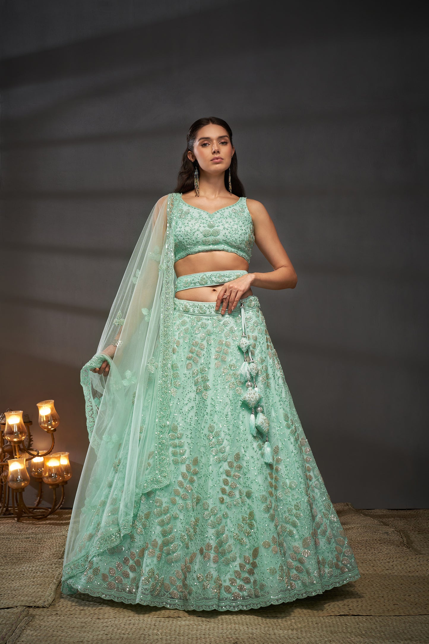 Turquoise blue Net Cutdana, Sequins and Zarkan embroidery Lehenga