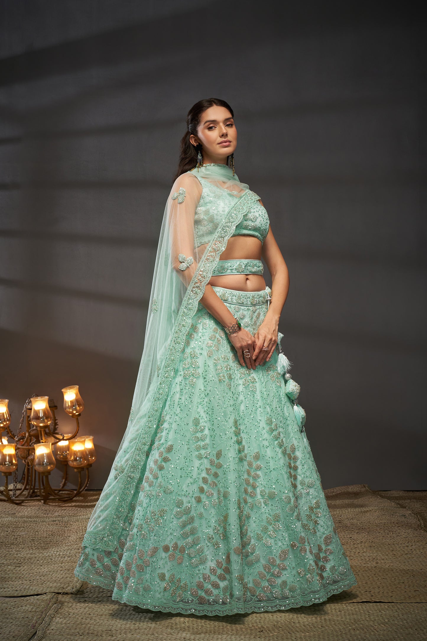 Turquoise blue Net Cutdana, Sequins and Zarkan embroidery Lehenga