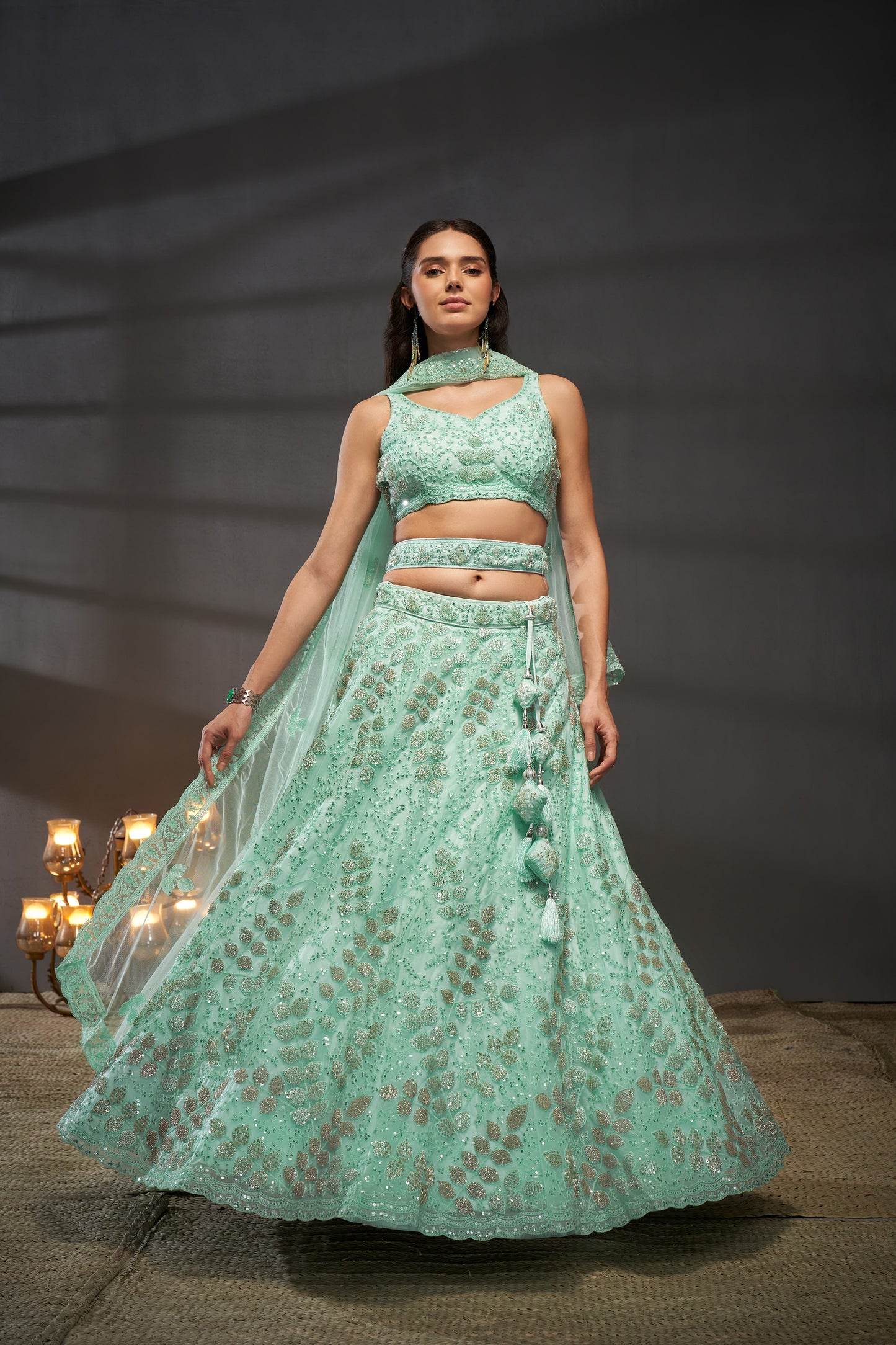 Turquoise blue Net Cutdana, Sequins and Zarkan embroidery Lehenga