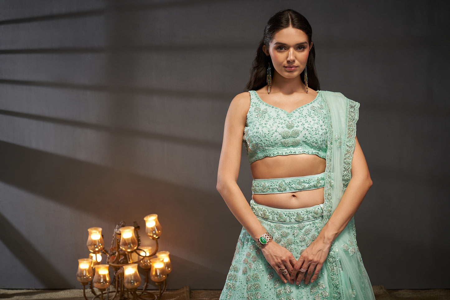 Turquoise blue Net Cutdana, Sequins and Zarkan embroidery Lehenga