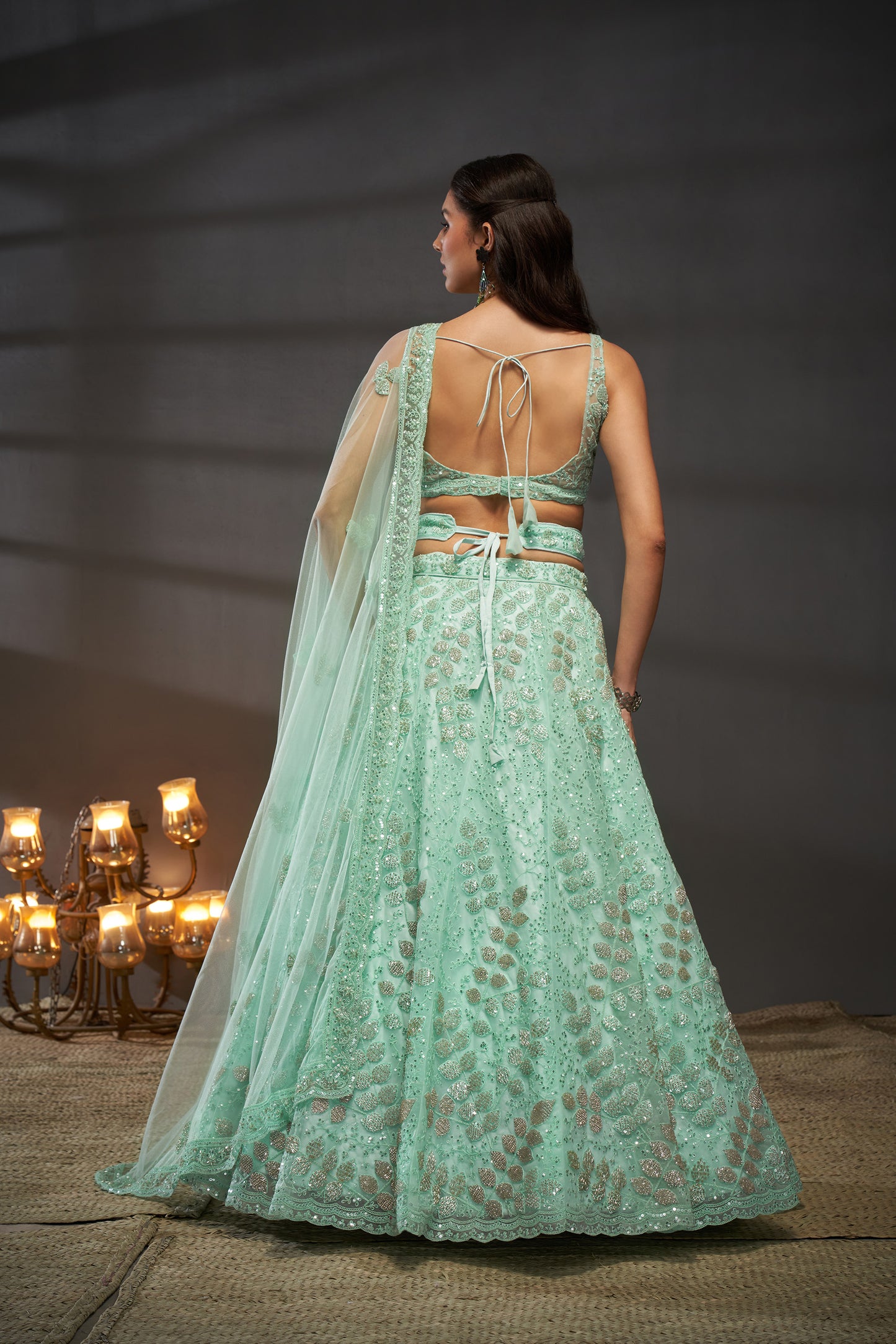 Turquoise blue Net Cutdana, Sequins and Zarkan embroidery Lehenga