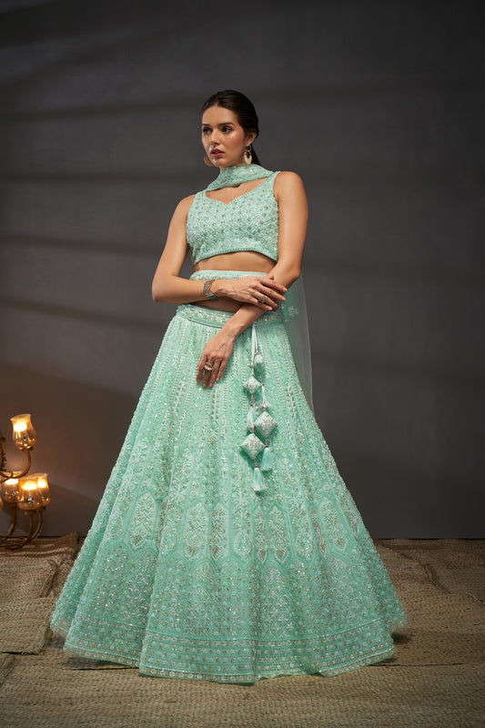 Turquoise blue Net Cutdana, Sequins and Zarkan embroidery Lehenga