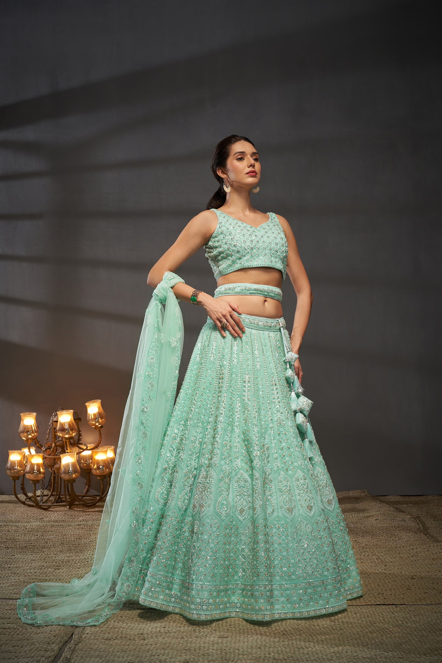 Turquoise blue Net Cutdana, Sequins and Zarkan embroidery Lehenga