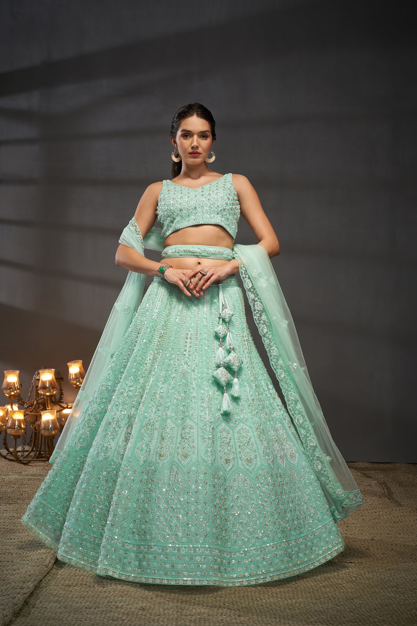 Turquoise blue Net Cutdana, Sequins and Zarkan embroidery Lehenga