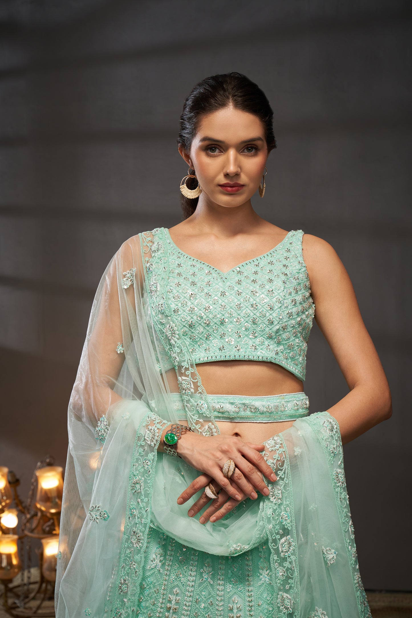 Turquoise blue Net Cutdana, Sequins and Zarkan embroidery Lehenga