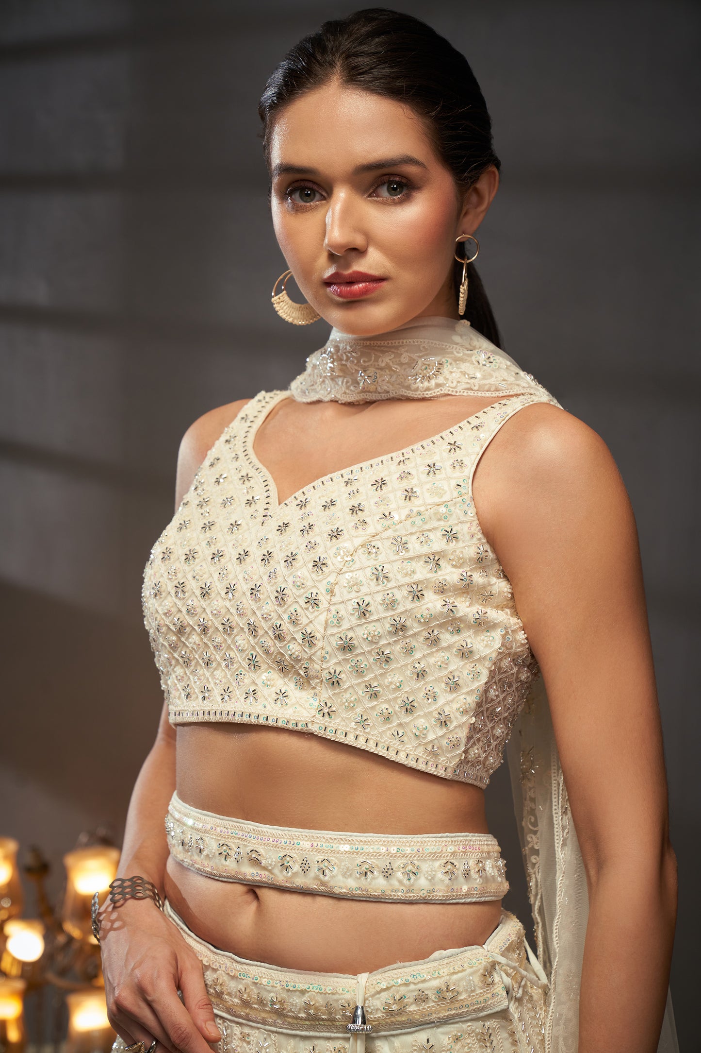 Cream Net Cutdana, Sequins and Zarkan embroidery Lehenga