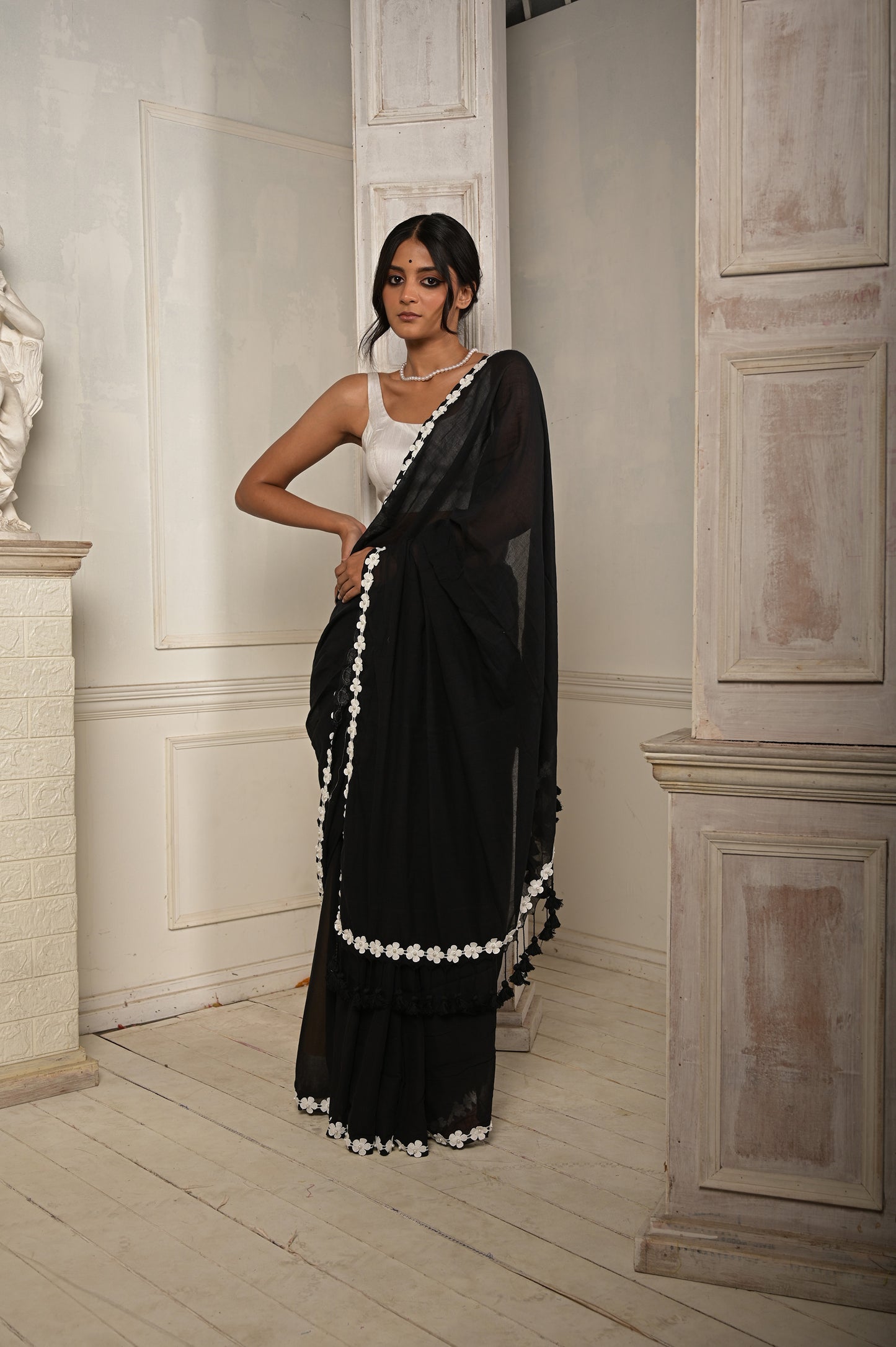 Nishi Raat | Black cotton saree with stitched lace floral embroidered border