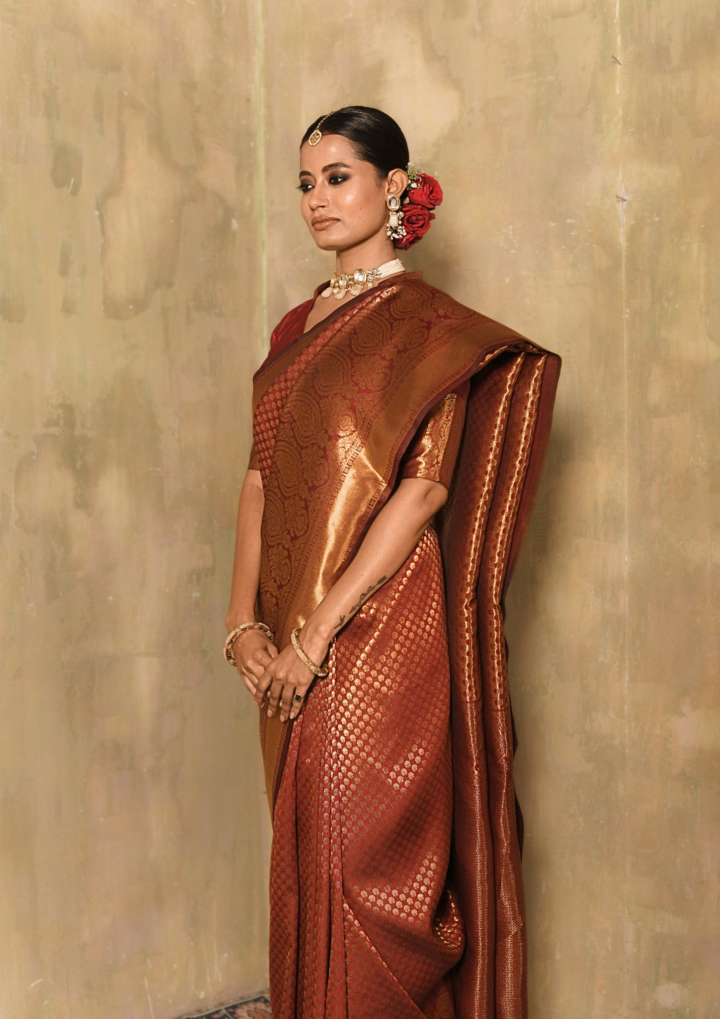 Gulnaar Maroon Zari Butti Saree