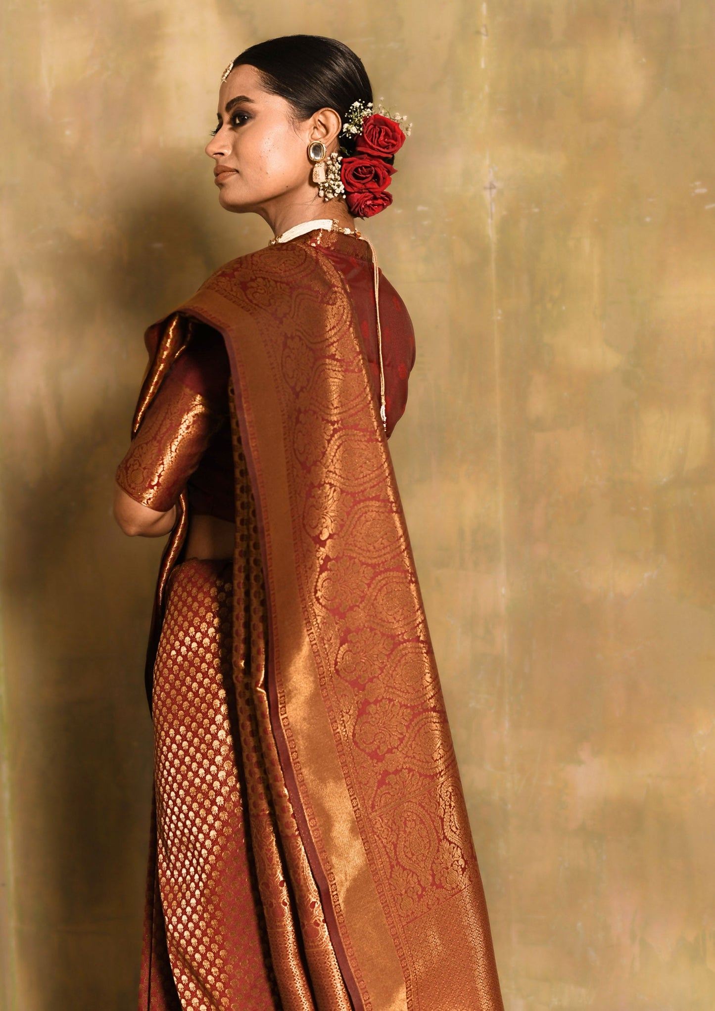 Gulnaar Maroon Zari Butti Saree