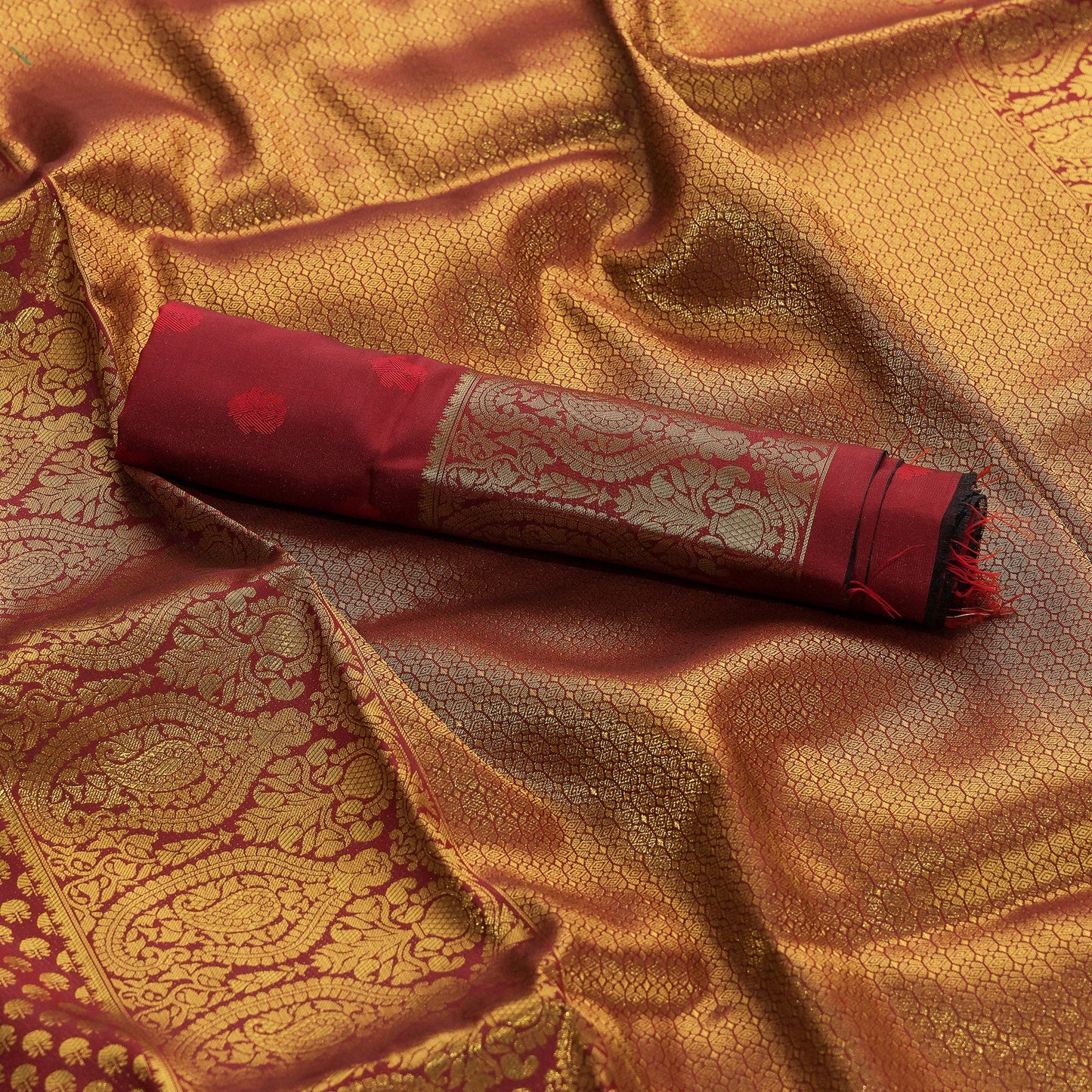 Gulnaar Maroon Zari Butti Saree