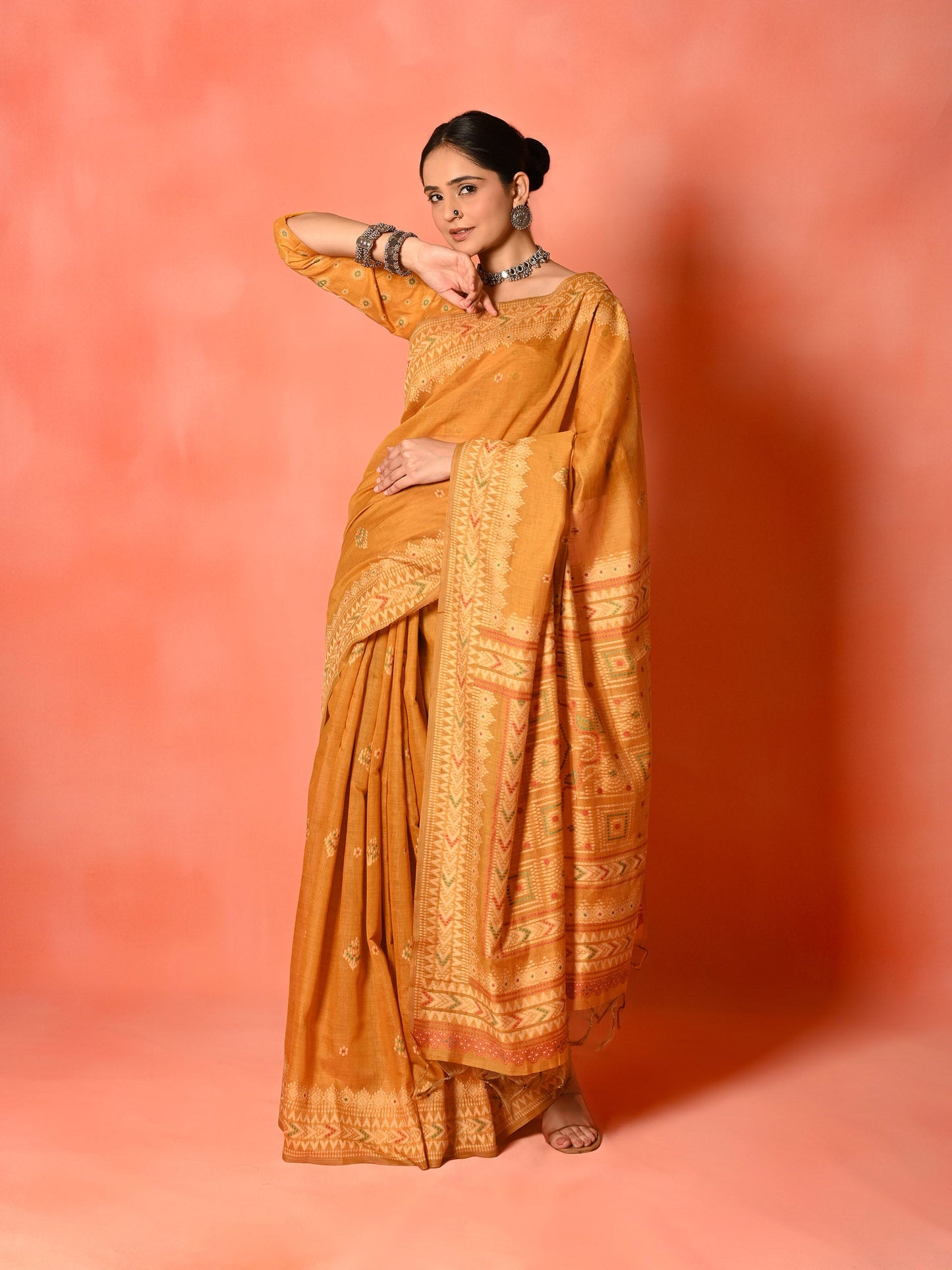 Rust Cotton Saree with Thread Weaving & Tassel Pallu