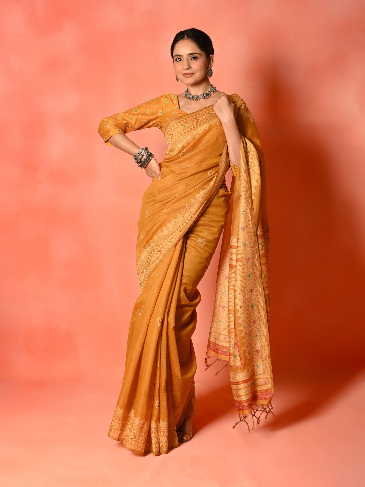 Rust Cotton Saree with Thread Weaving & Tassel Pallu