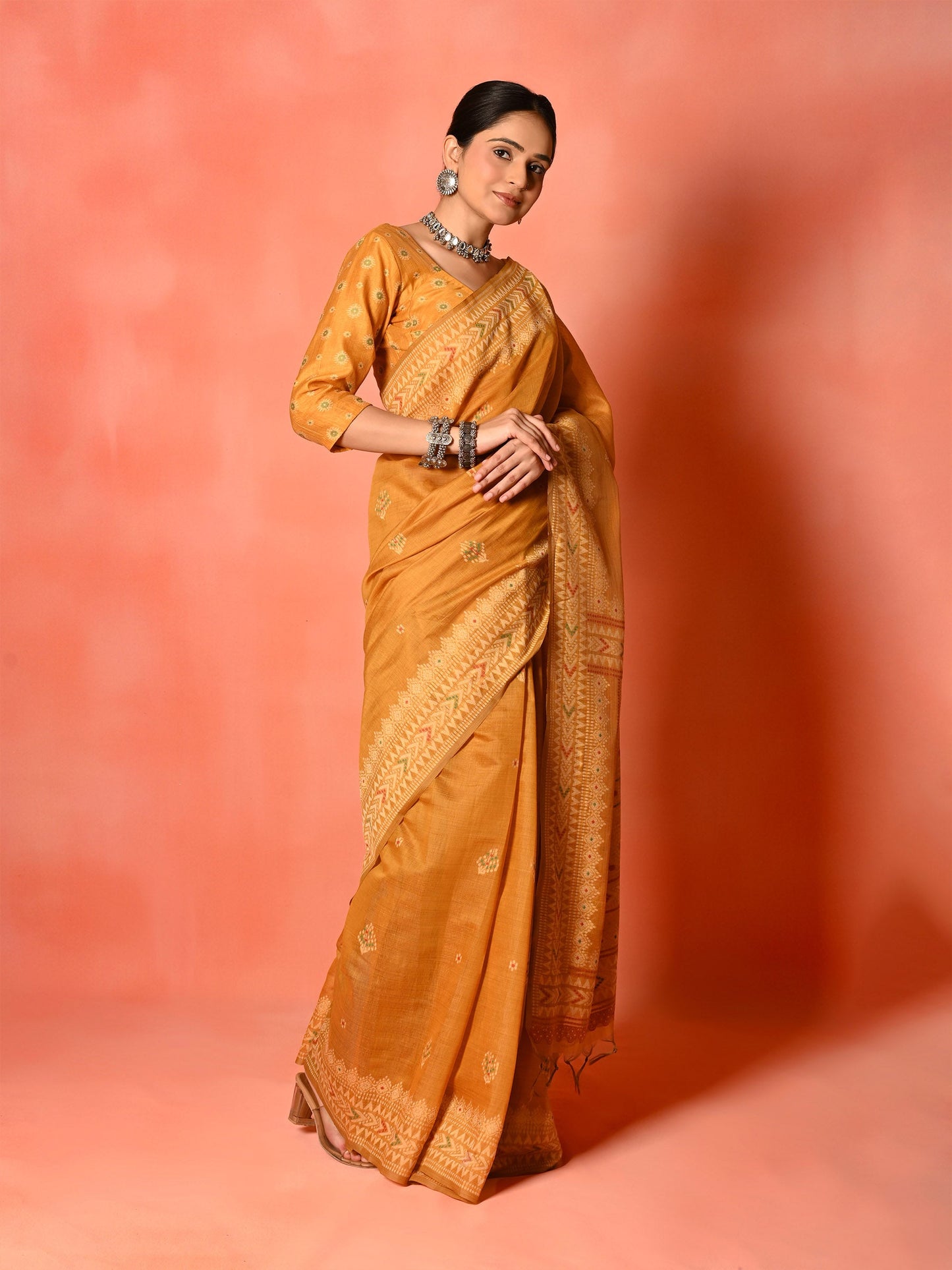 Rust Cotton Saree with Thread Weaving & Tassel Pallu