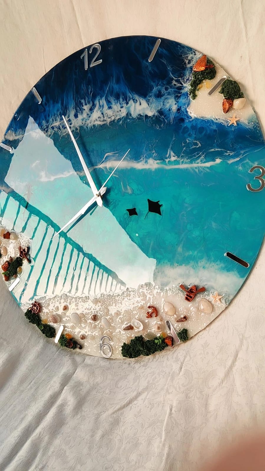 This Ocean Life Resin Wall Clock brings the serenity of the ocean into your home. Handcrafted with high-quality resin, the intricate design showcases the beauty of m