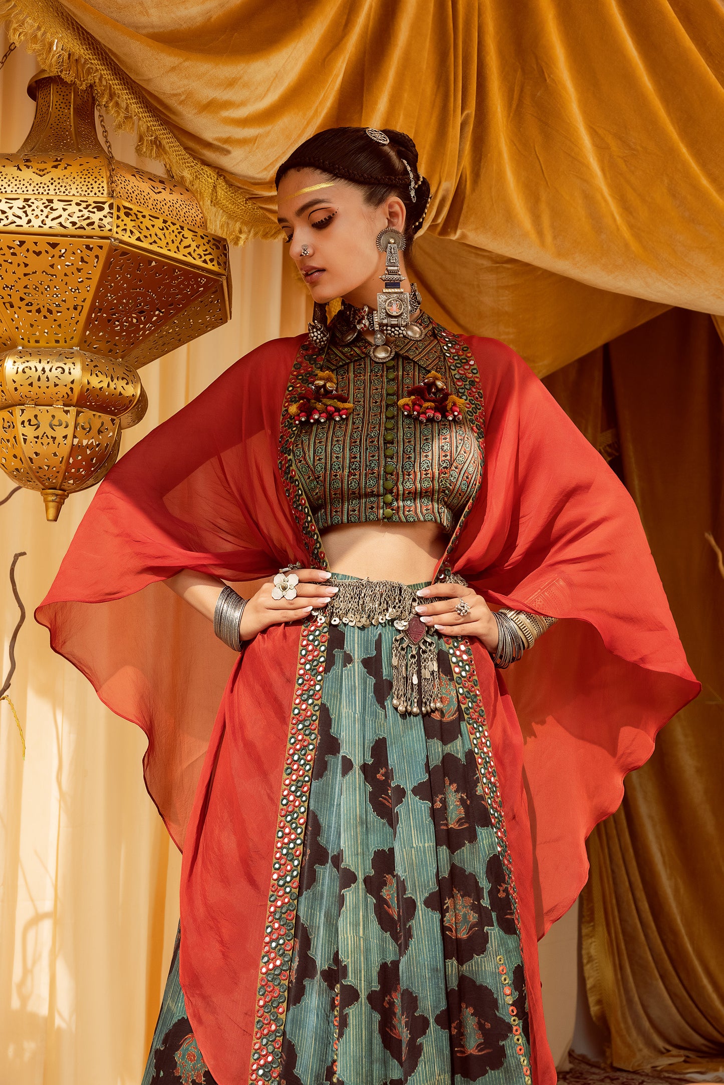 Printed Lehenga & printed blouse with rust cape