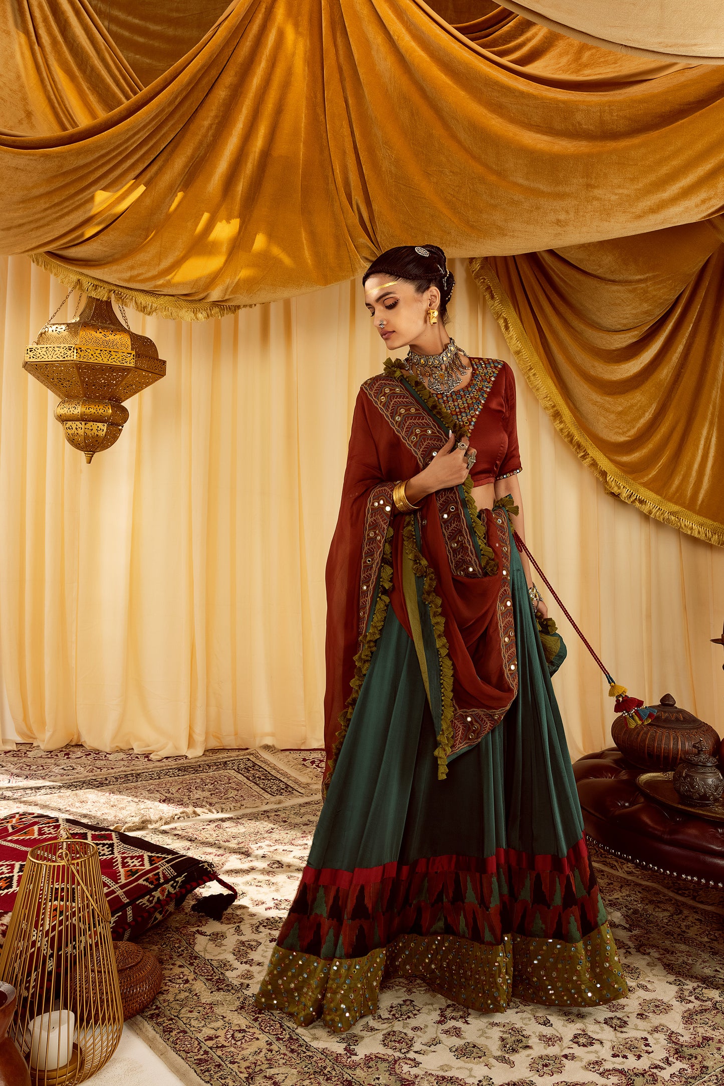 Teal lehenga with rust choli & hand embroidered dupatta