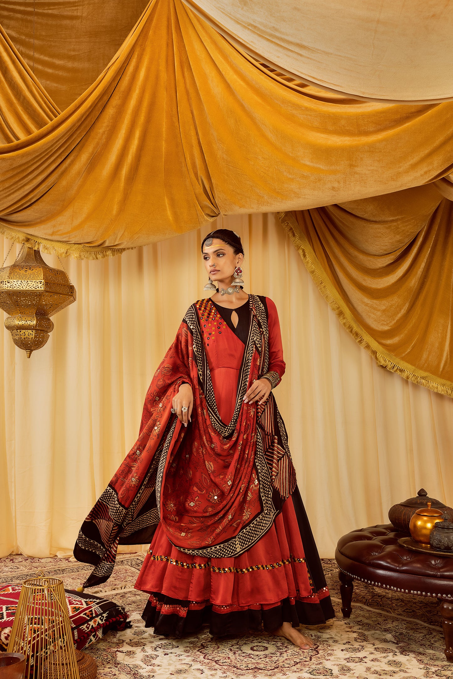 Red layered Anarkali suit with churidaar