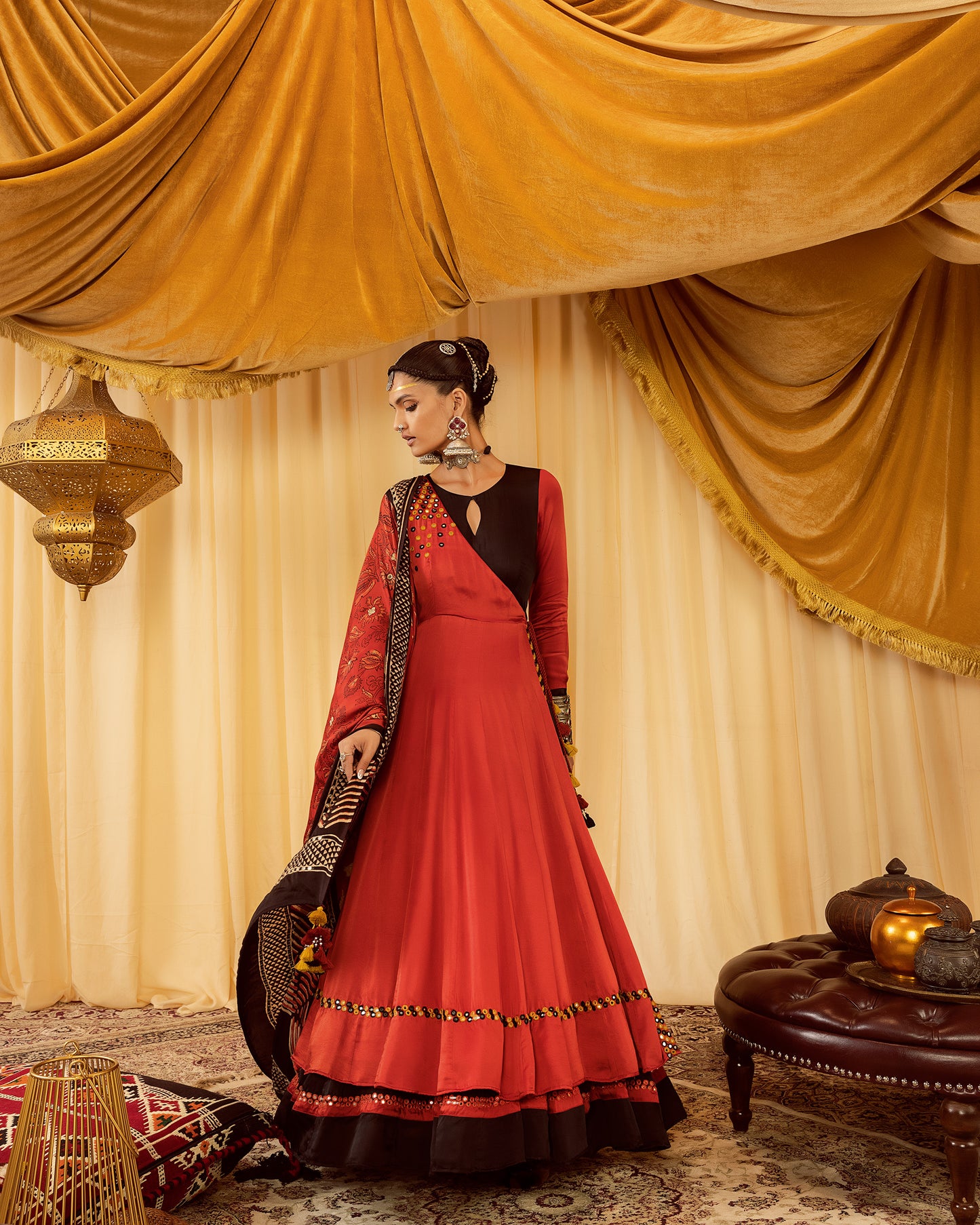 Red layered Anarkali suit with churidaar