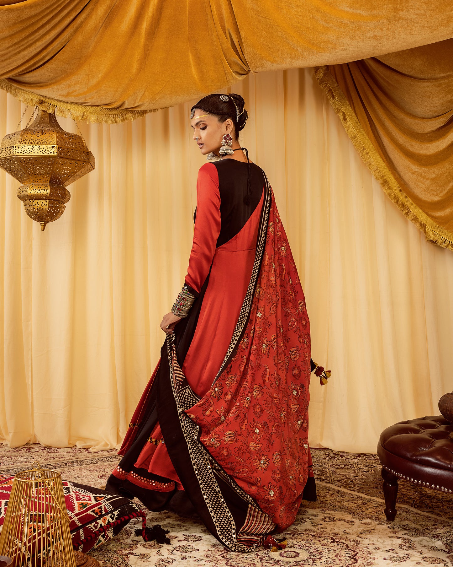 Red layered Anarkali suit with churidaar