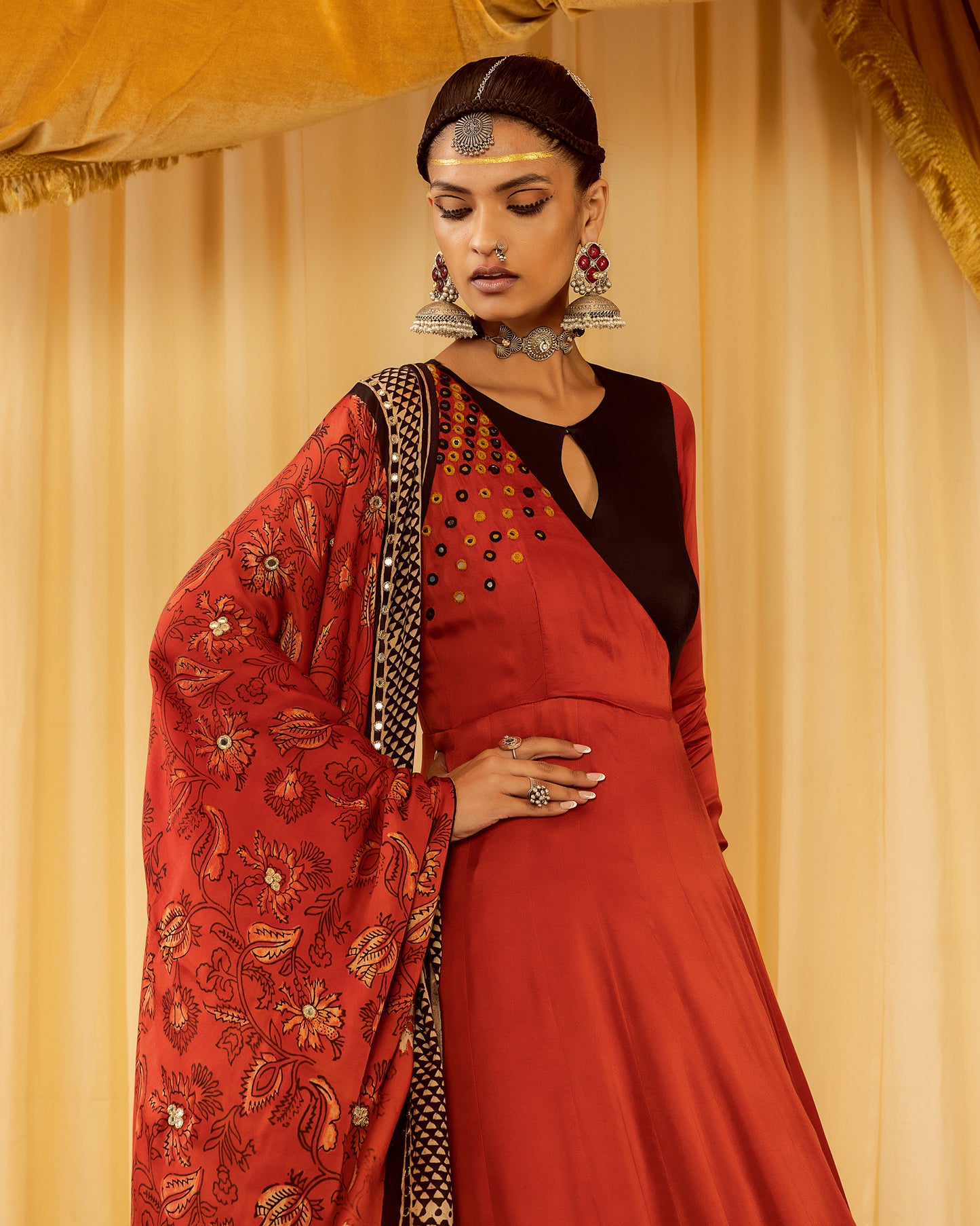 Red layered Anarkali suit with churidaar