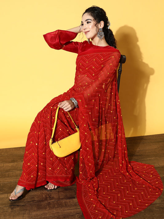 Red colored Bandhani polyester georgette saree with mirror work