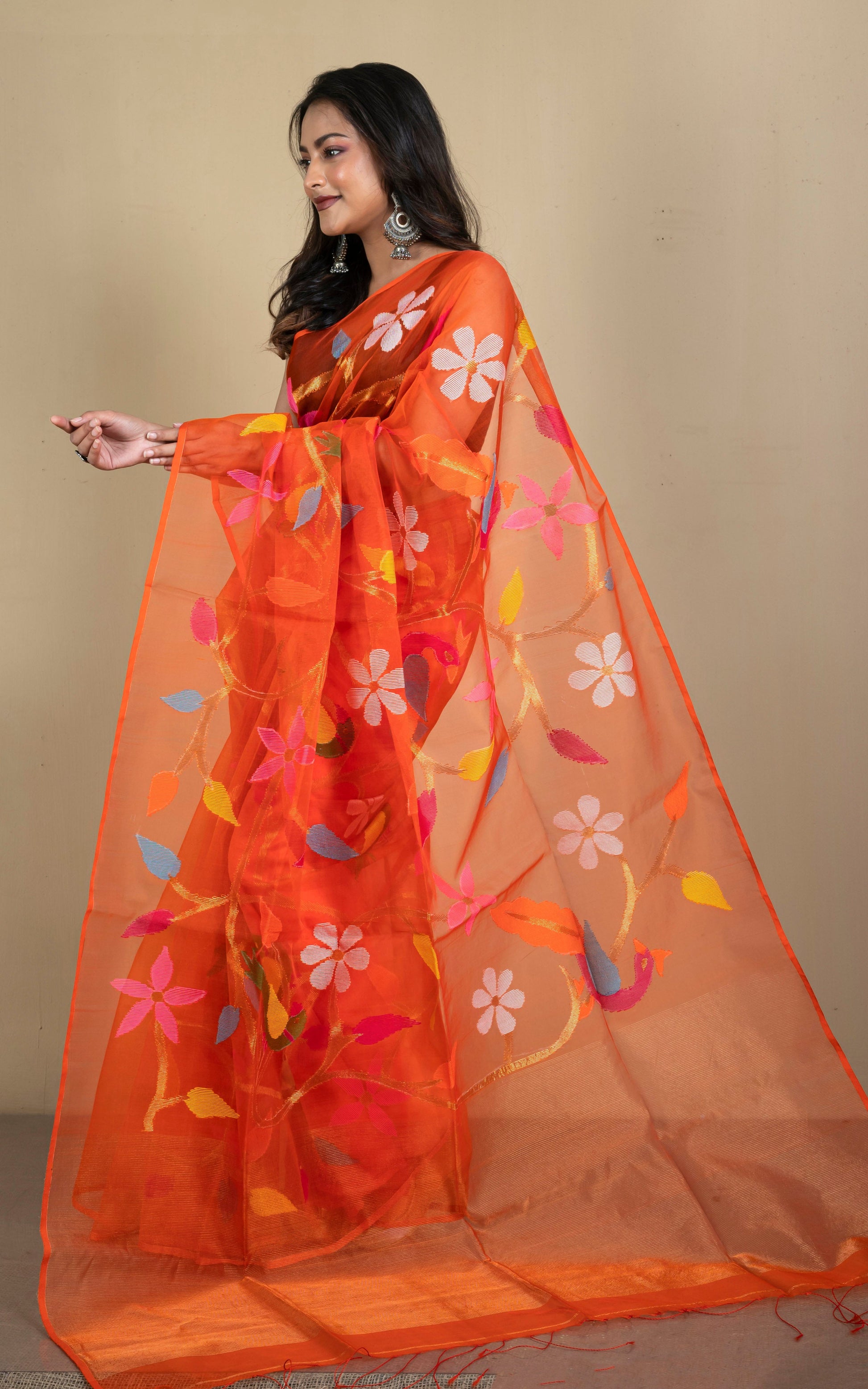 Peacock and Floral Motif Work Muslin Silk Jamdani Saree in Orange, Golden and Multicolored Thread Work