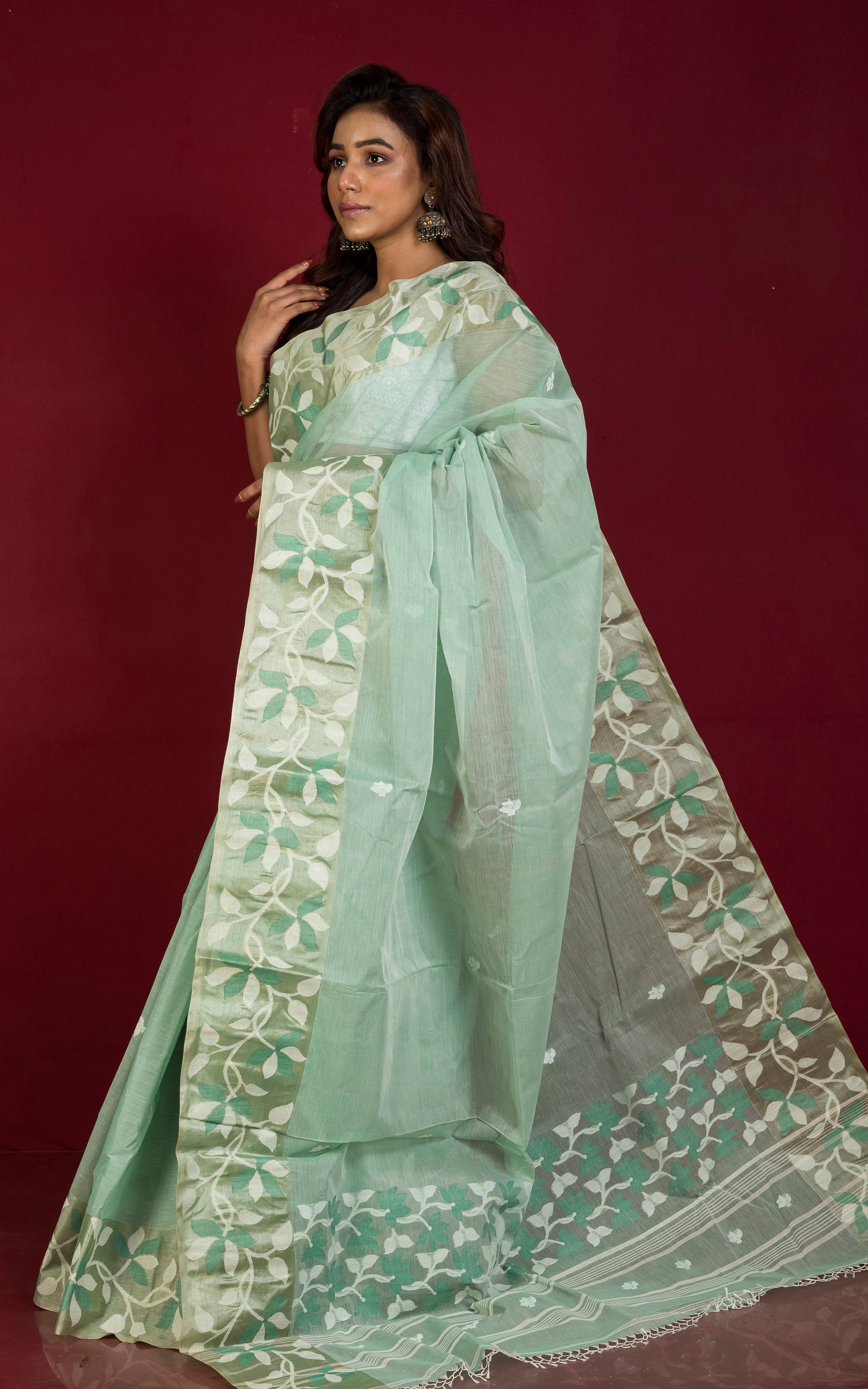 Tussar Silk Hand Woven Lotus Nakshi Border Cotton Dhakai Jamdani Saree in Sea green, Off White and Golden Beige