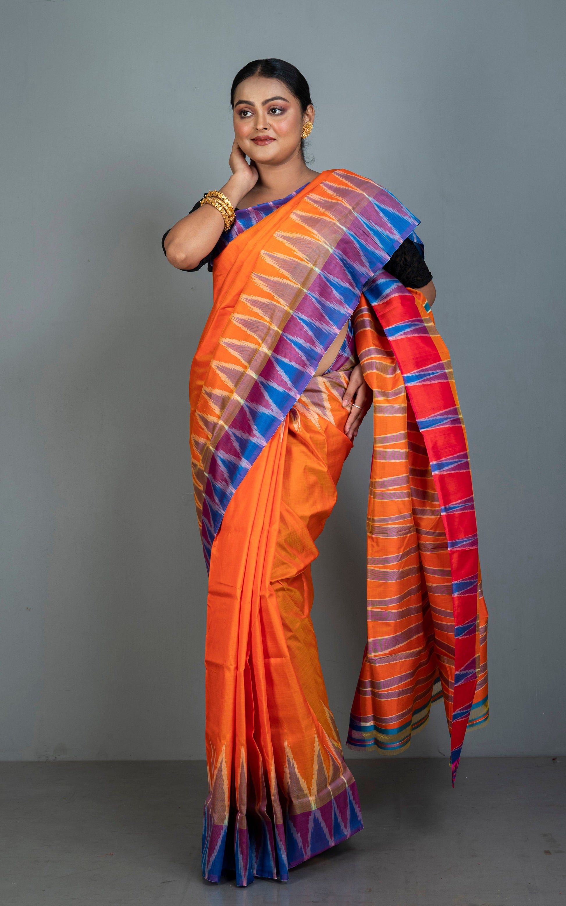 Bishnupuri Double Ikkat Pure Silk Saree in Orange, Blue, Purple and Red